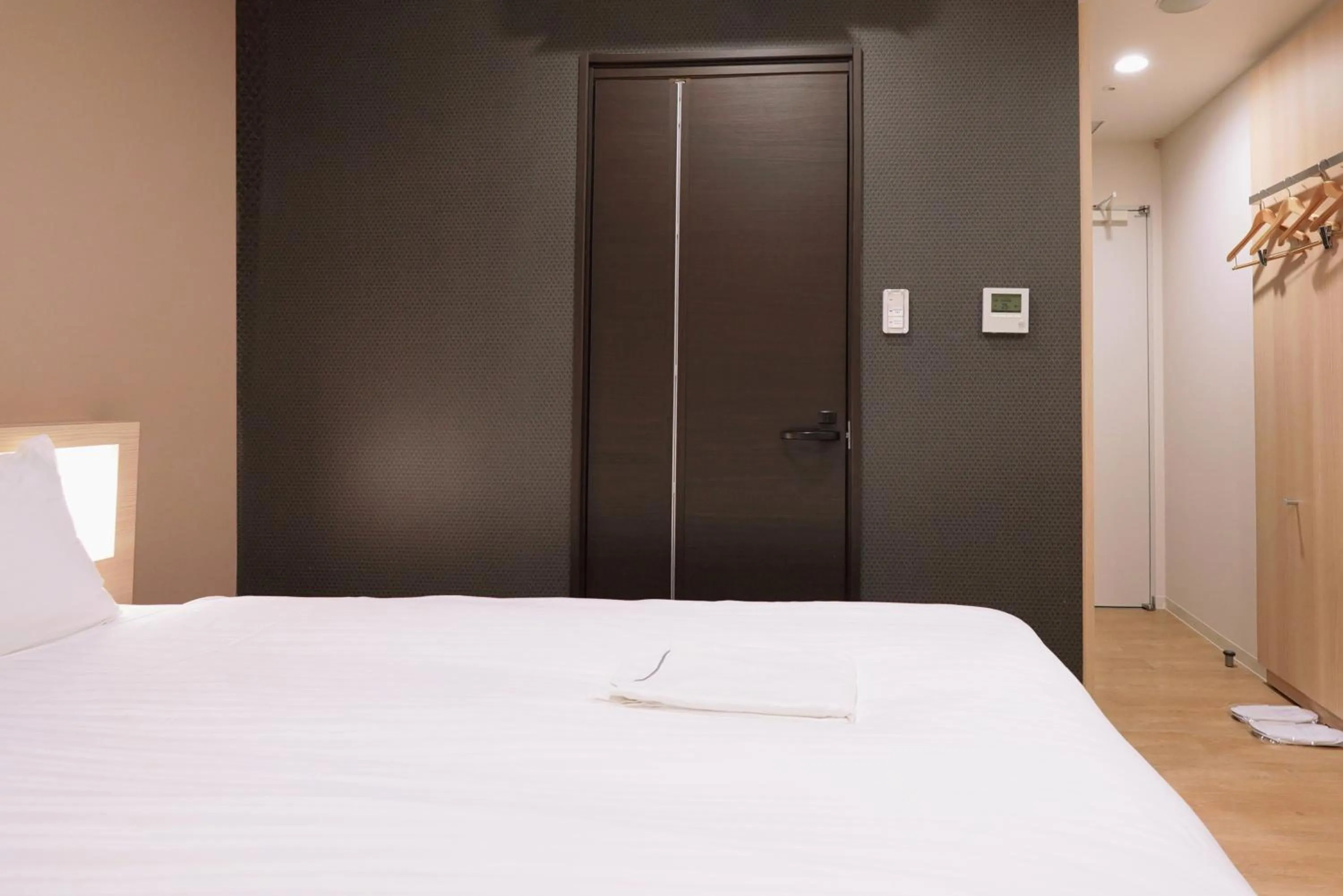 Bed in Park Central Sakura Hotel