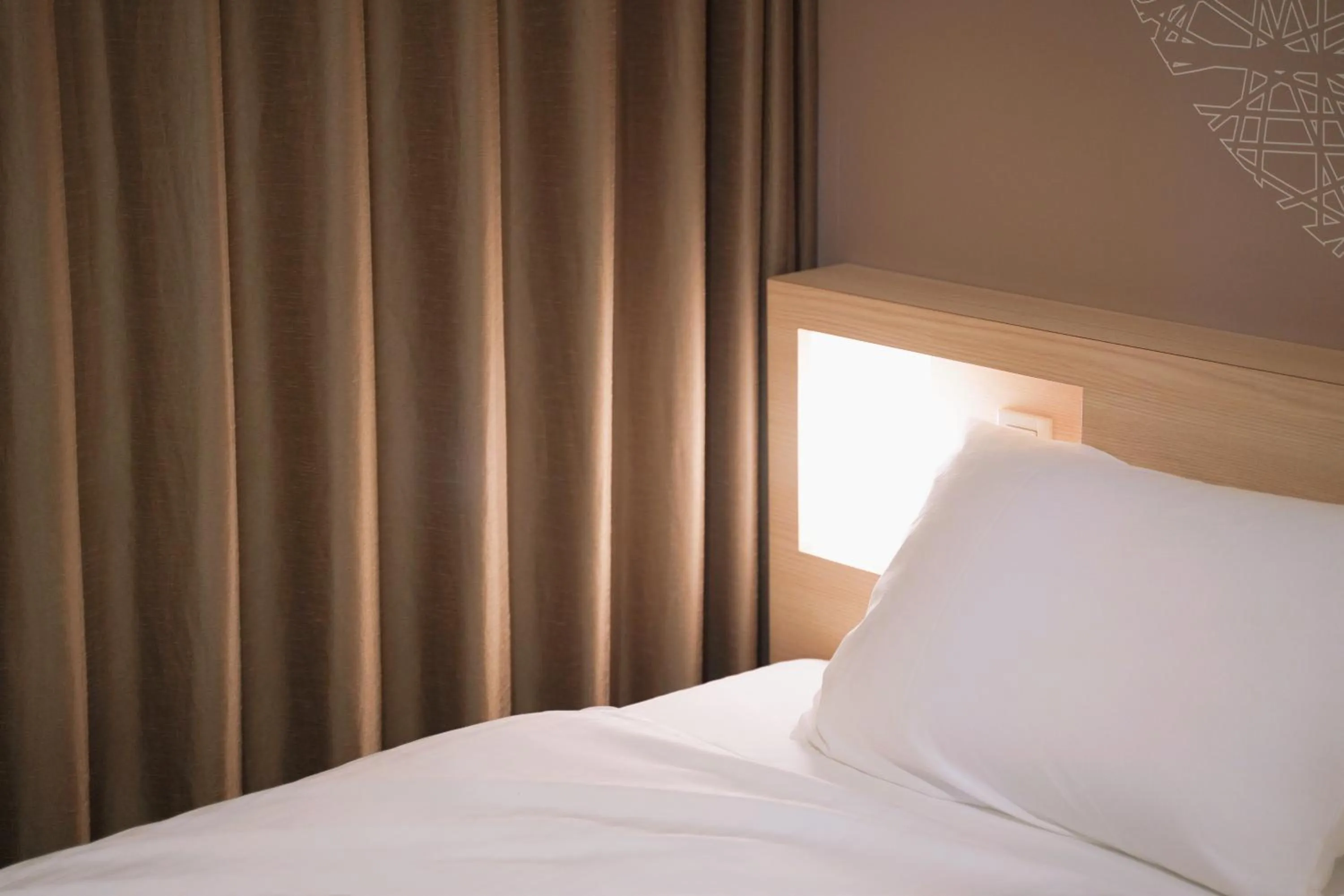 Bed in Park Central Sakura Hotel