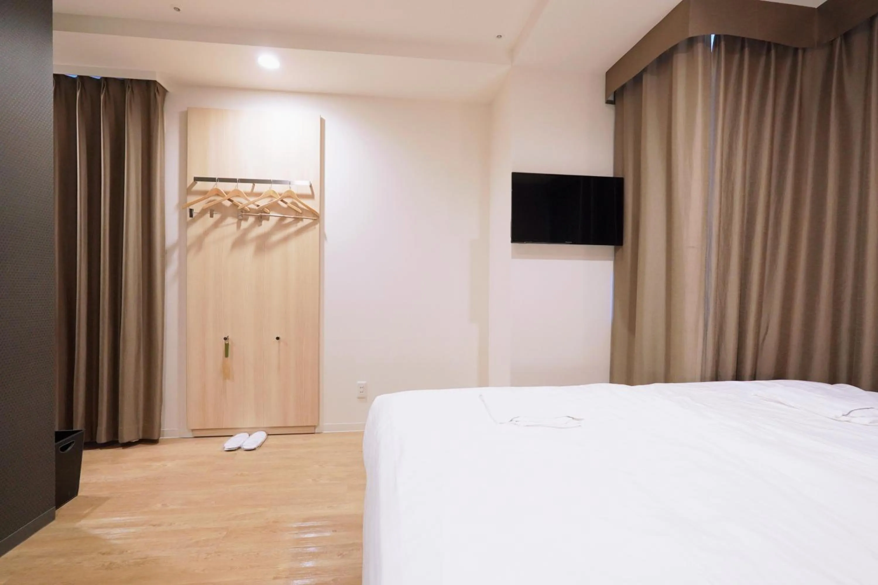 Bed in Park Central Sakura Hotel