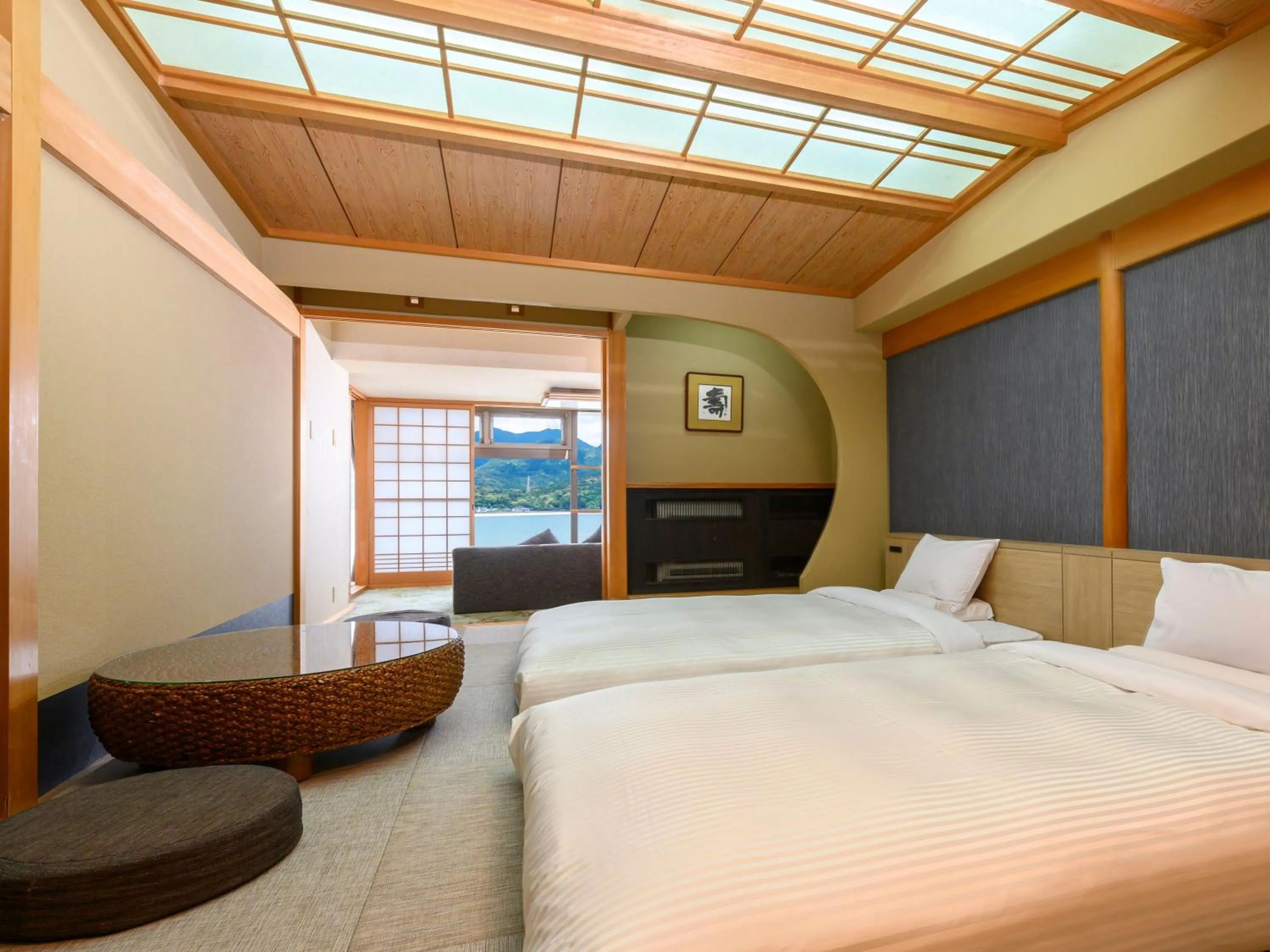 Bed in KAMENOI HOTEL Nachi Katsuura