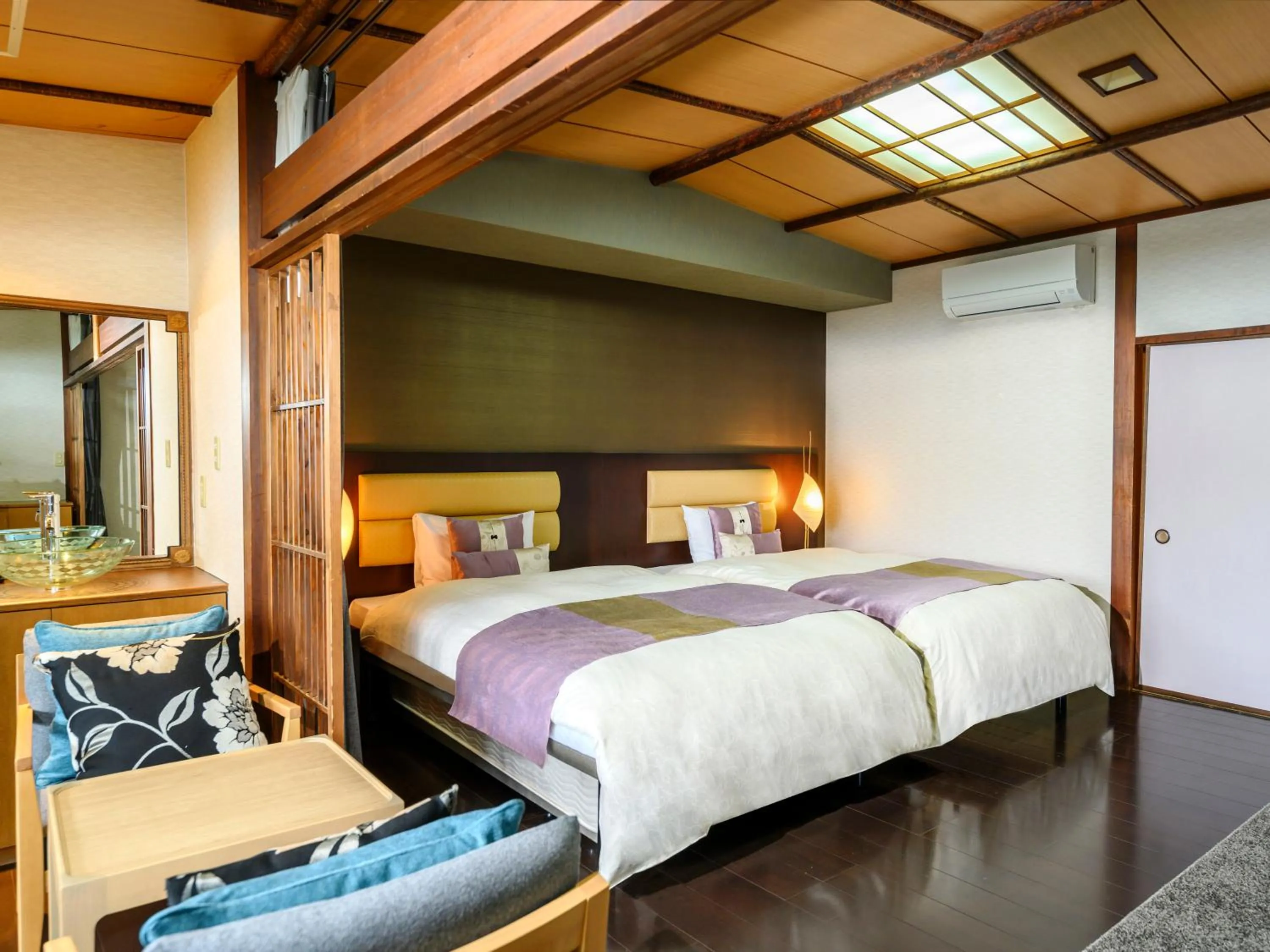 Bed in KAMENOI HOTEL Nachi Katsuura