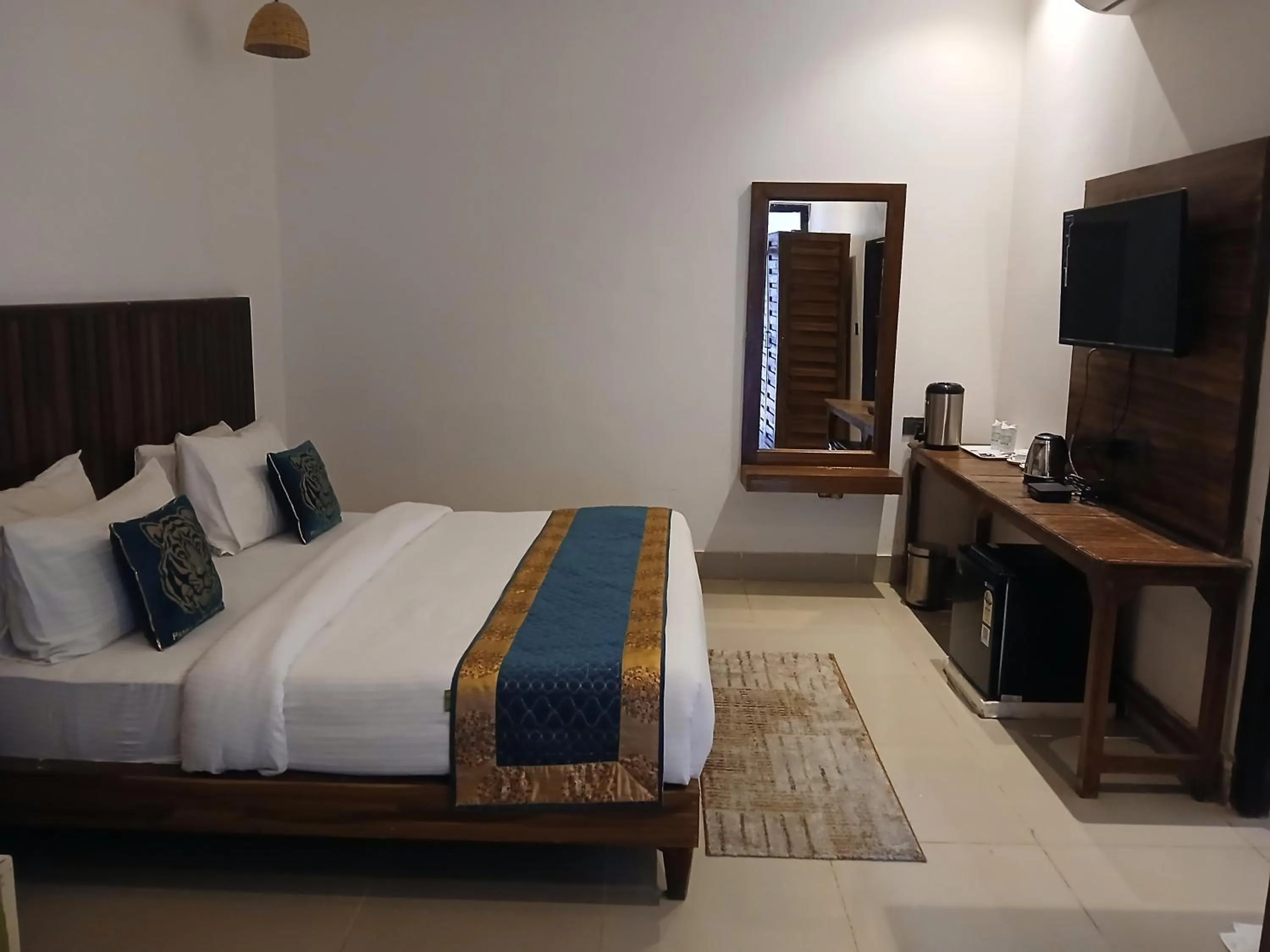 Photo of the whole room, Bed in Panna Tiger Resort- Riverside Property