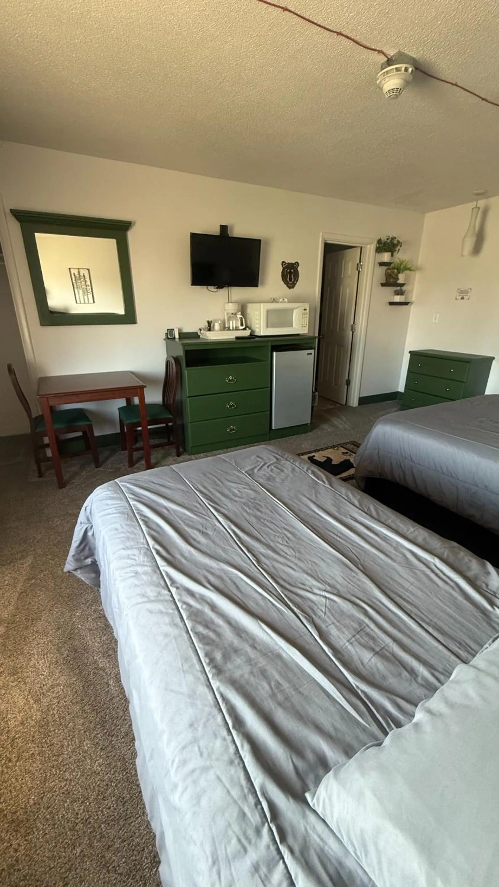 Bed in The Kenai Inn