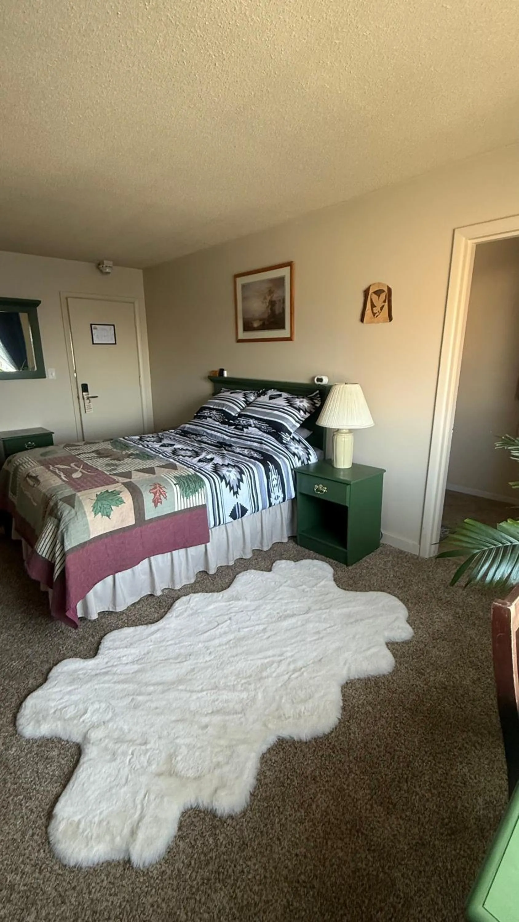 Bed in The Kenai Inn