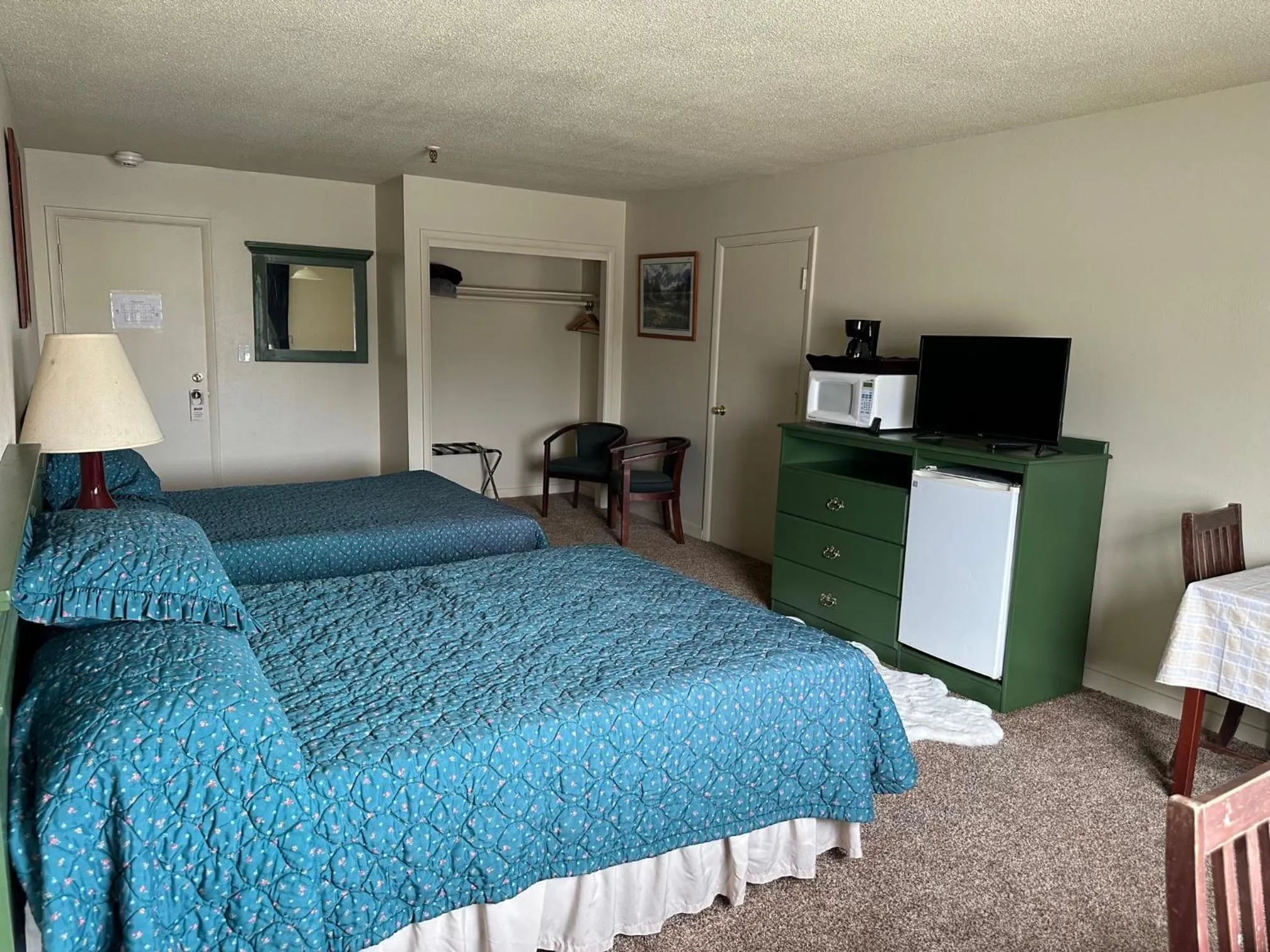 Bed in The Kenai Inn