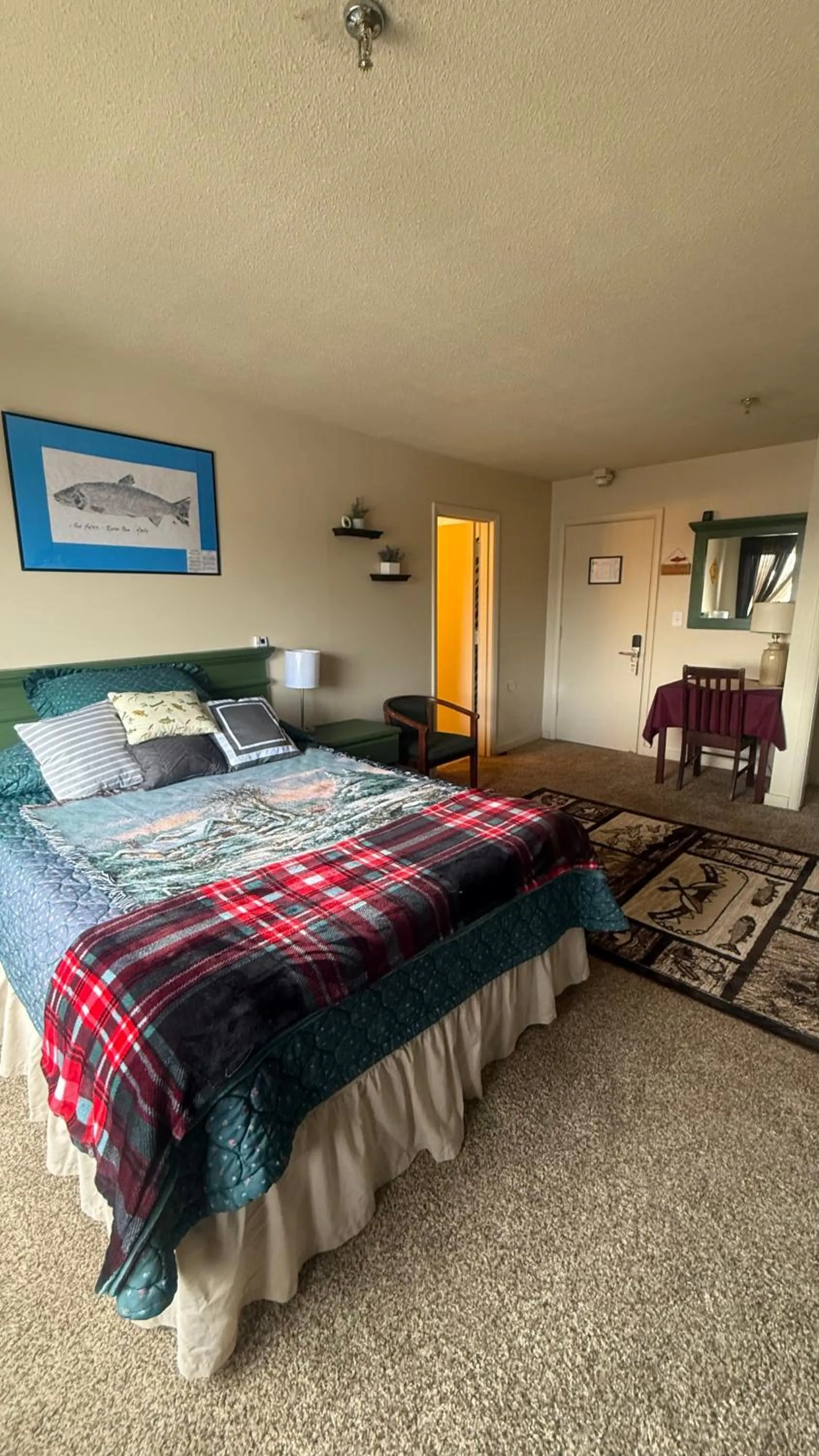 Bed in The Kenai Inn