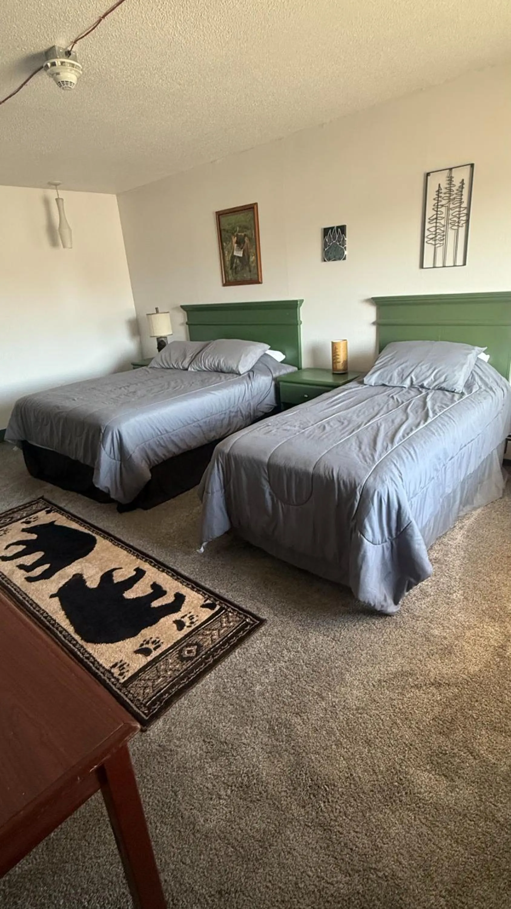 Bed in The Kenai Inn