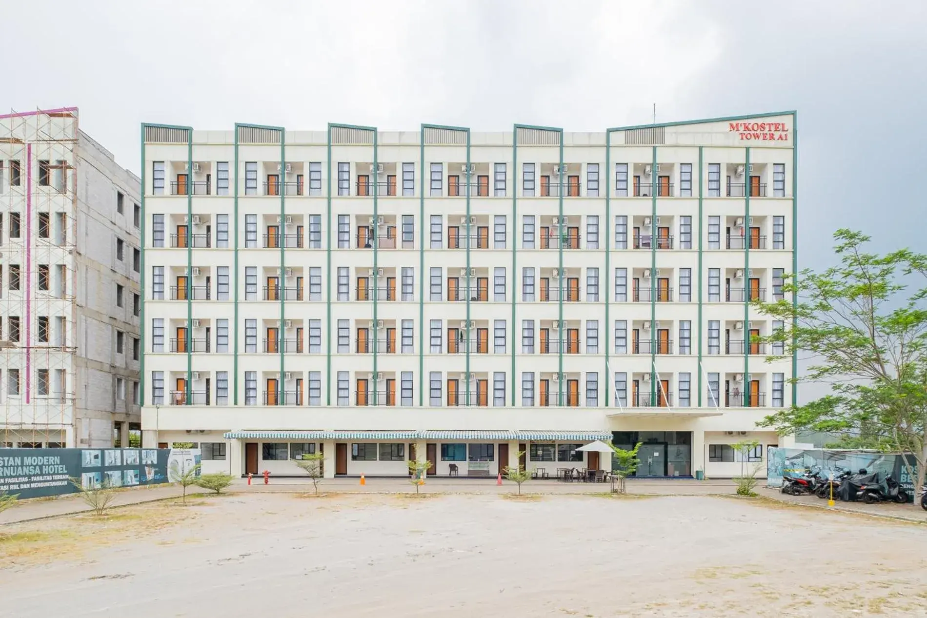 Property building in RedLiving Syariah Apartemen MKostel - Tower A1 Kencana Loka Property building in RedLiving Syariah Apartemen MKostel - Tower A1 Kencana Loka