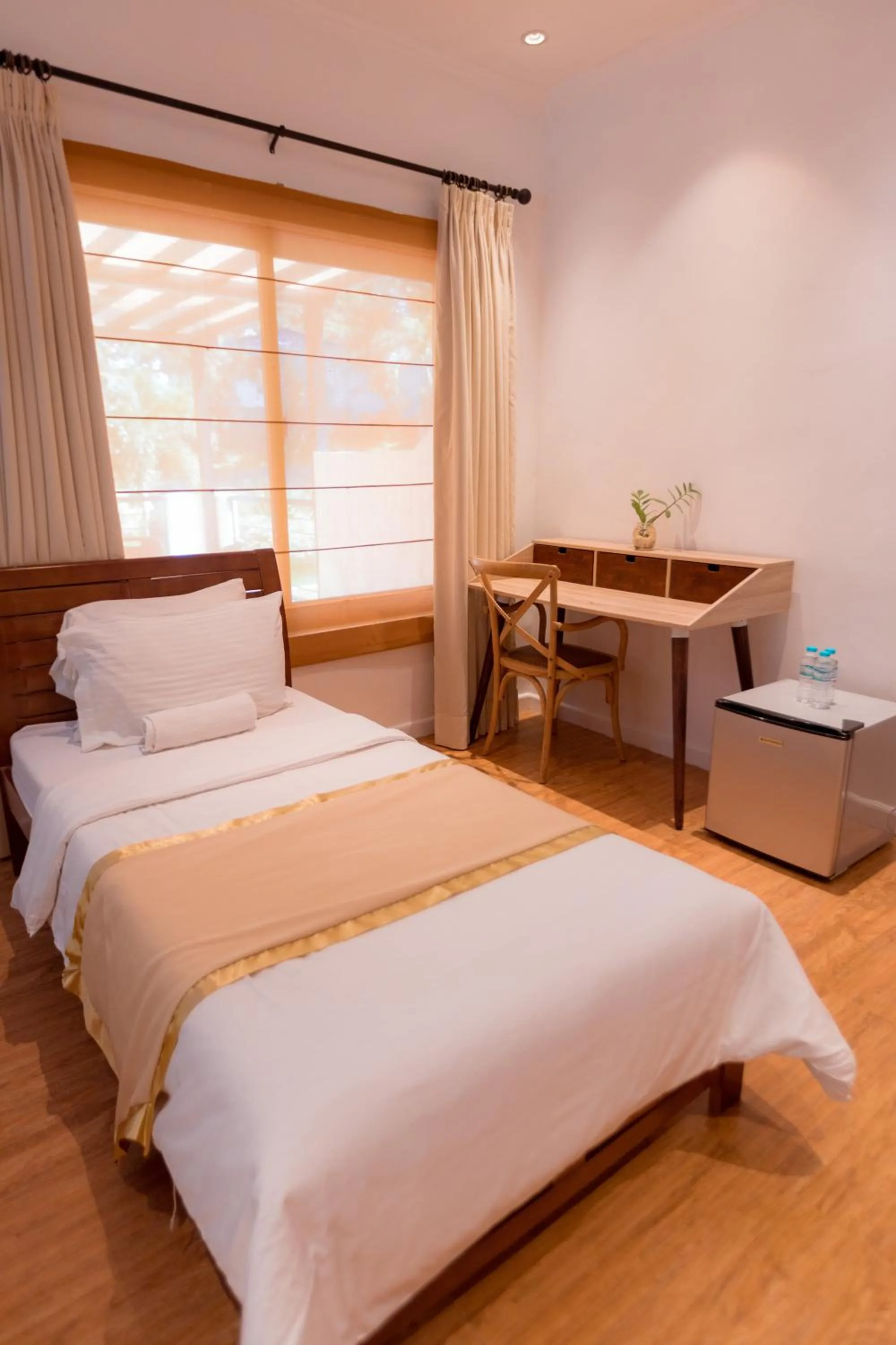 Bed in Bellagio Hills Hotel and Restaurant