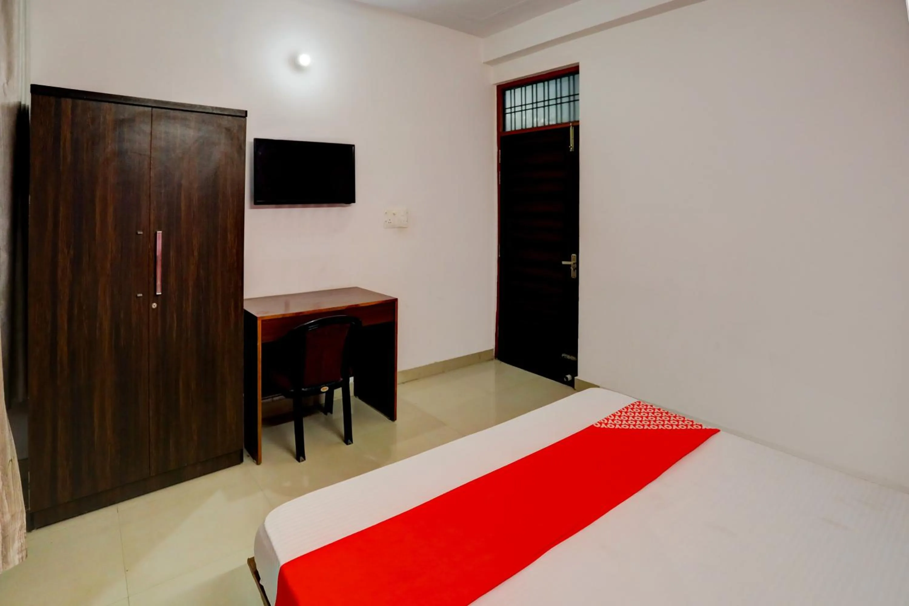 Bedroom in Hotel O Virasat Guest House