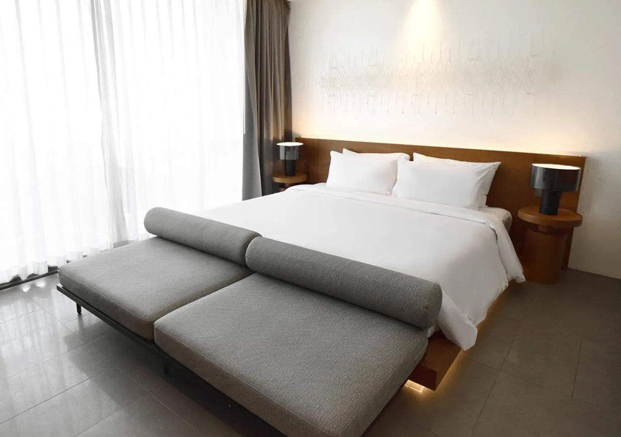 Bed in Arun Khiri Chiang Mai Hotel