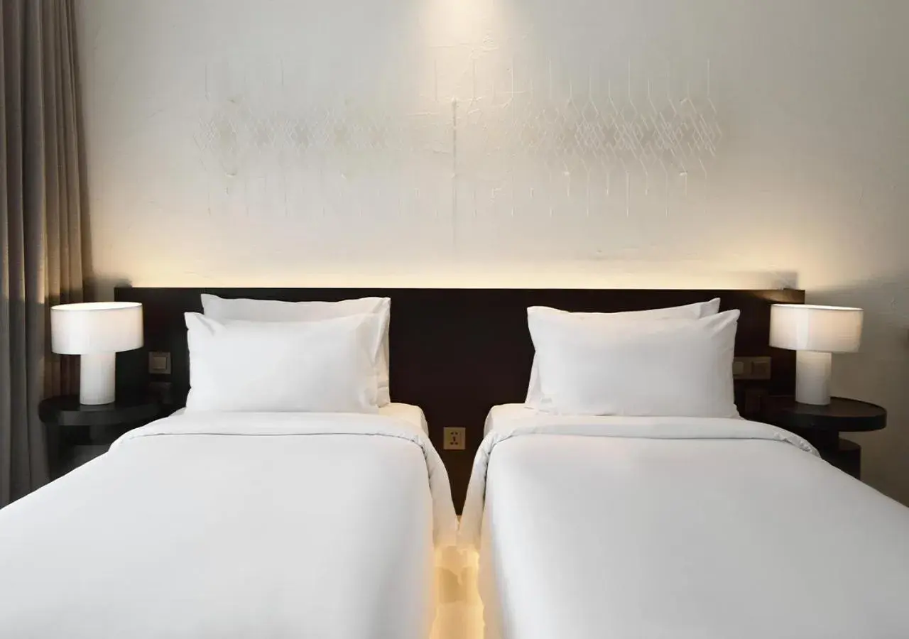 Bed in Arun Khiri Chiang Mai Hotel Bed in Arun Khiri Chiang Mai Hotel