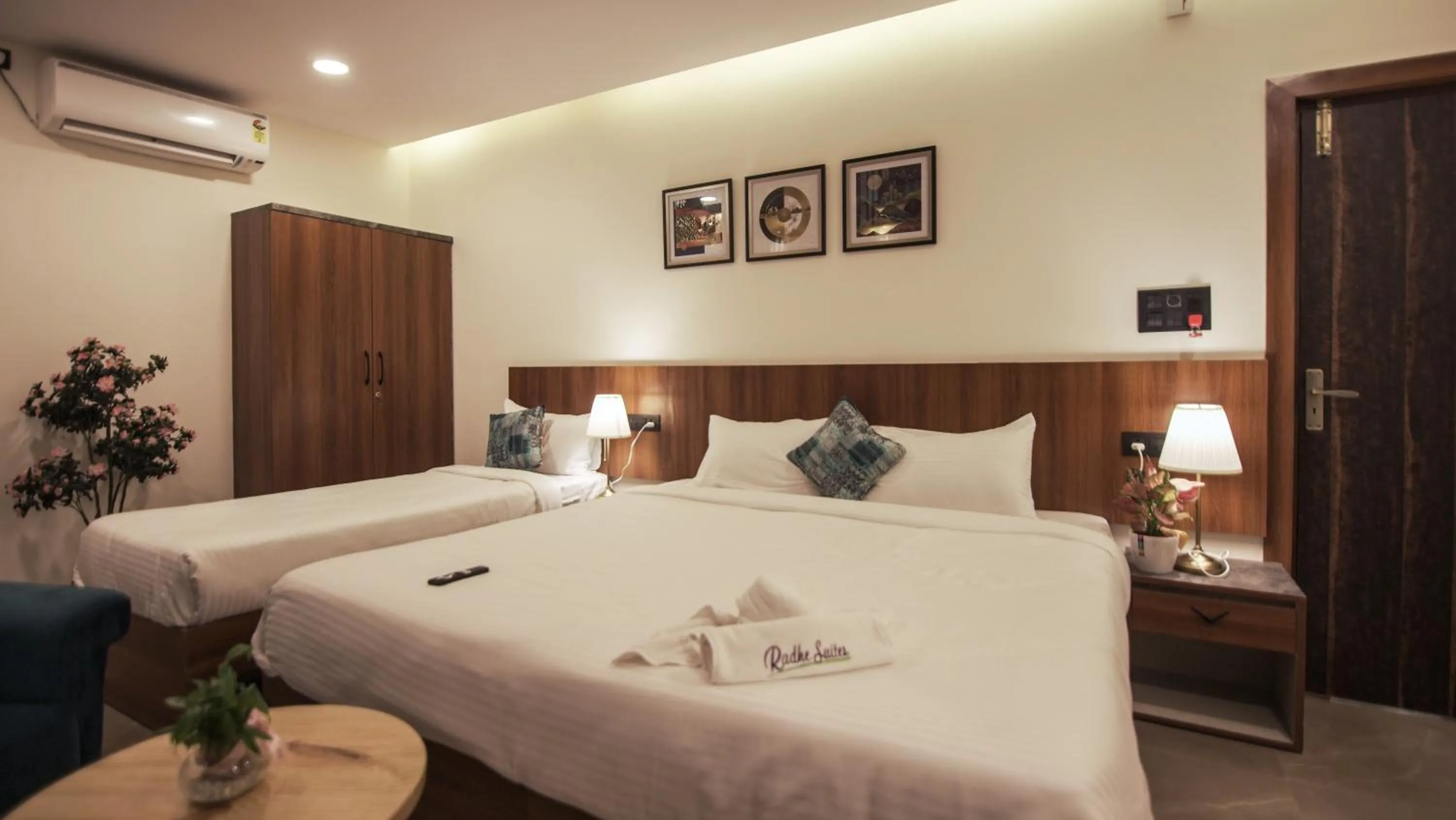 Bed in Radhe Suites