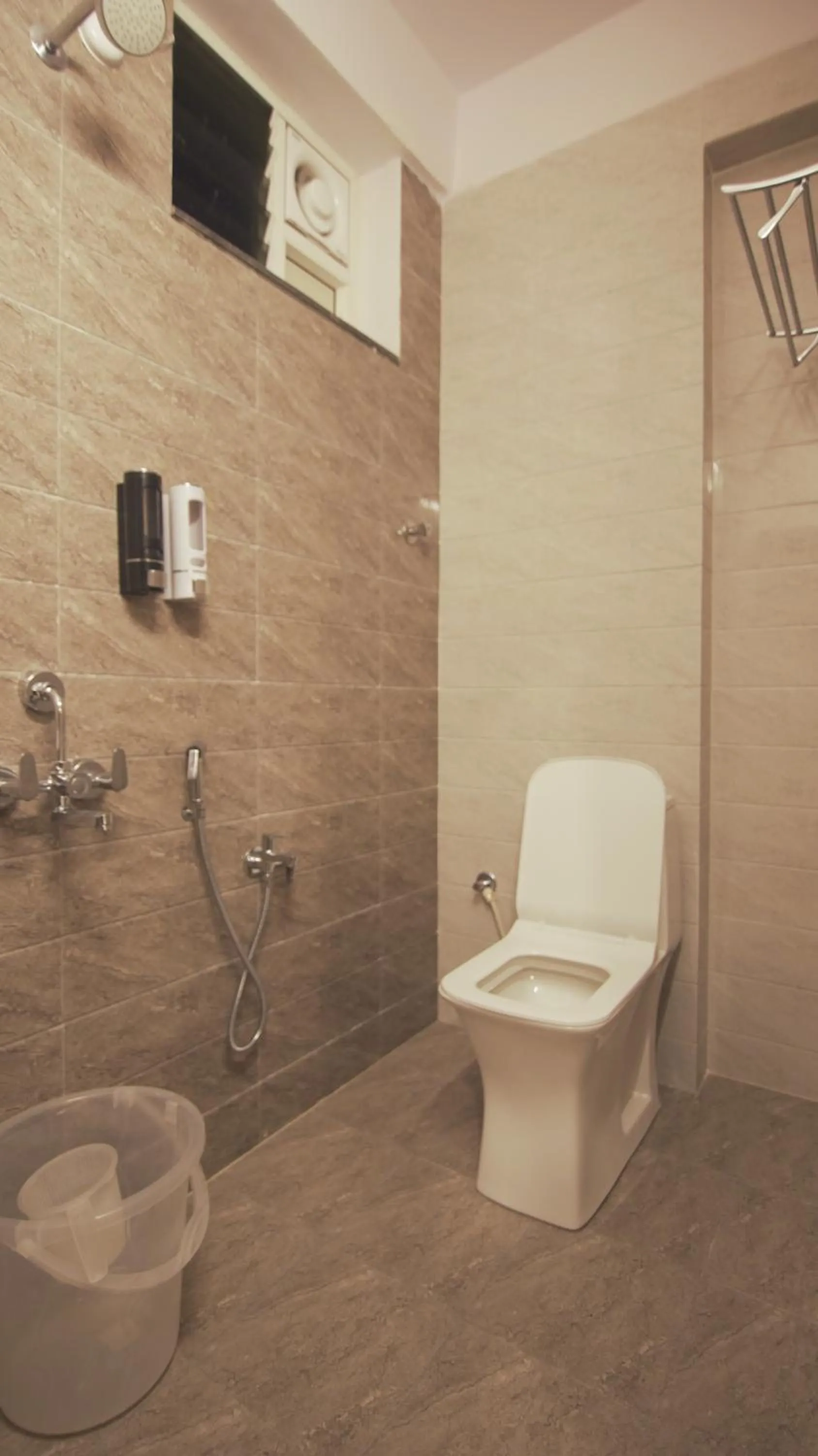 Shower in Radhe Suites