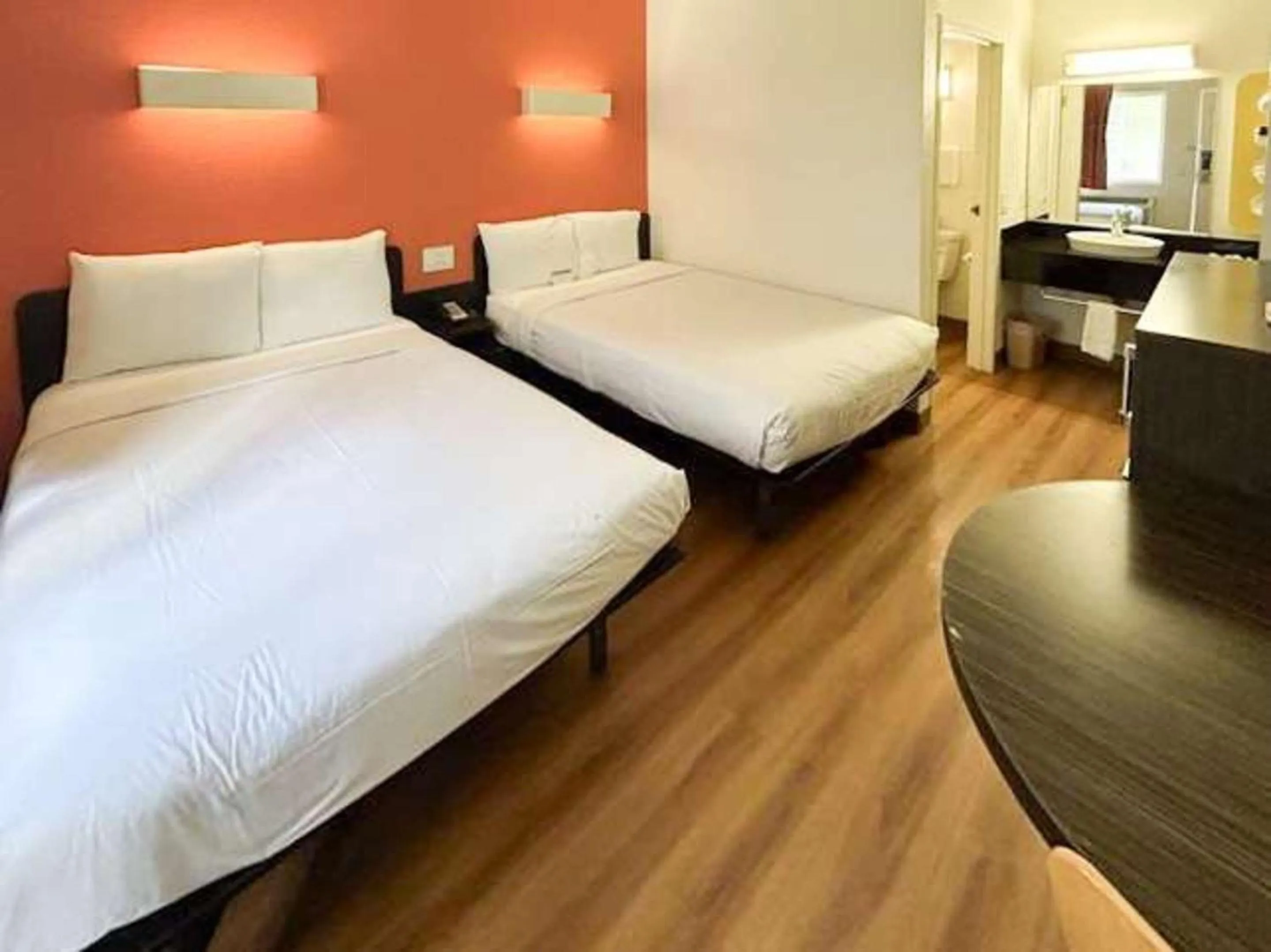 Bedroom, Bed in Studio 6 Suites - Riverside, CA South