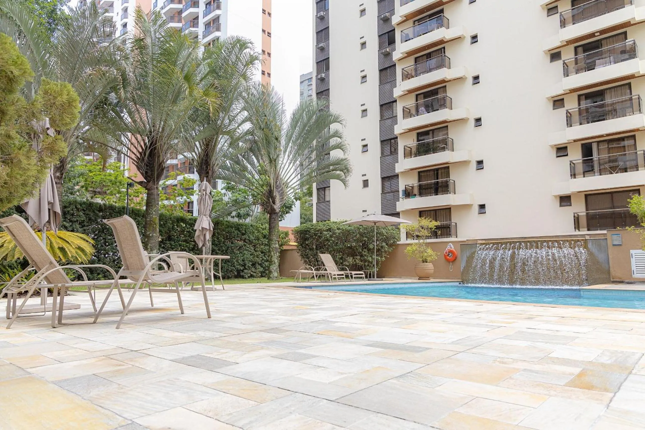 Pool view in Elegant Flat Internacional Plaza-Garagem e Piscina