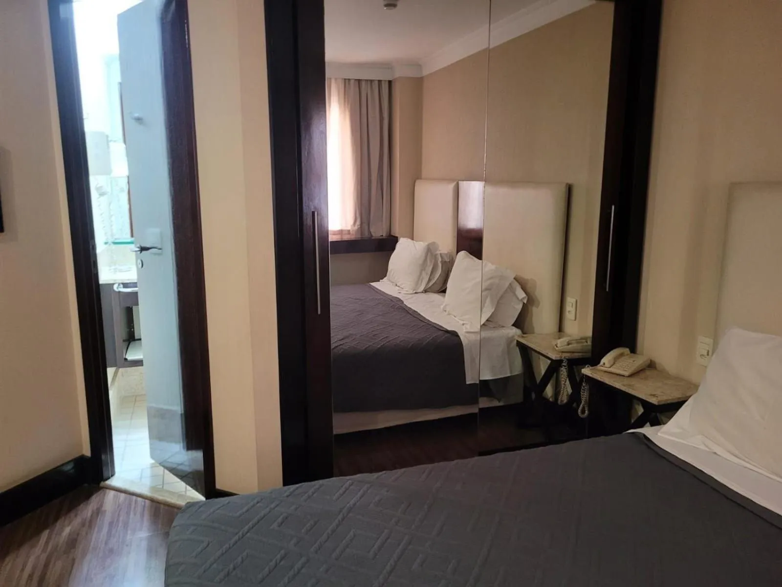 Bed in Elegant Flat Internacional Plaza-Garagem e Piscina