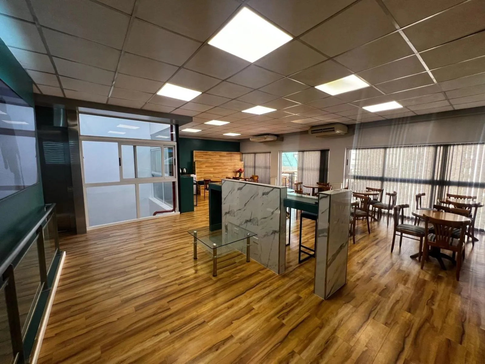 Communal lounge/ TV room in Goya Hotel