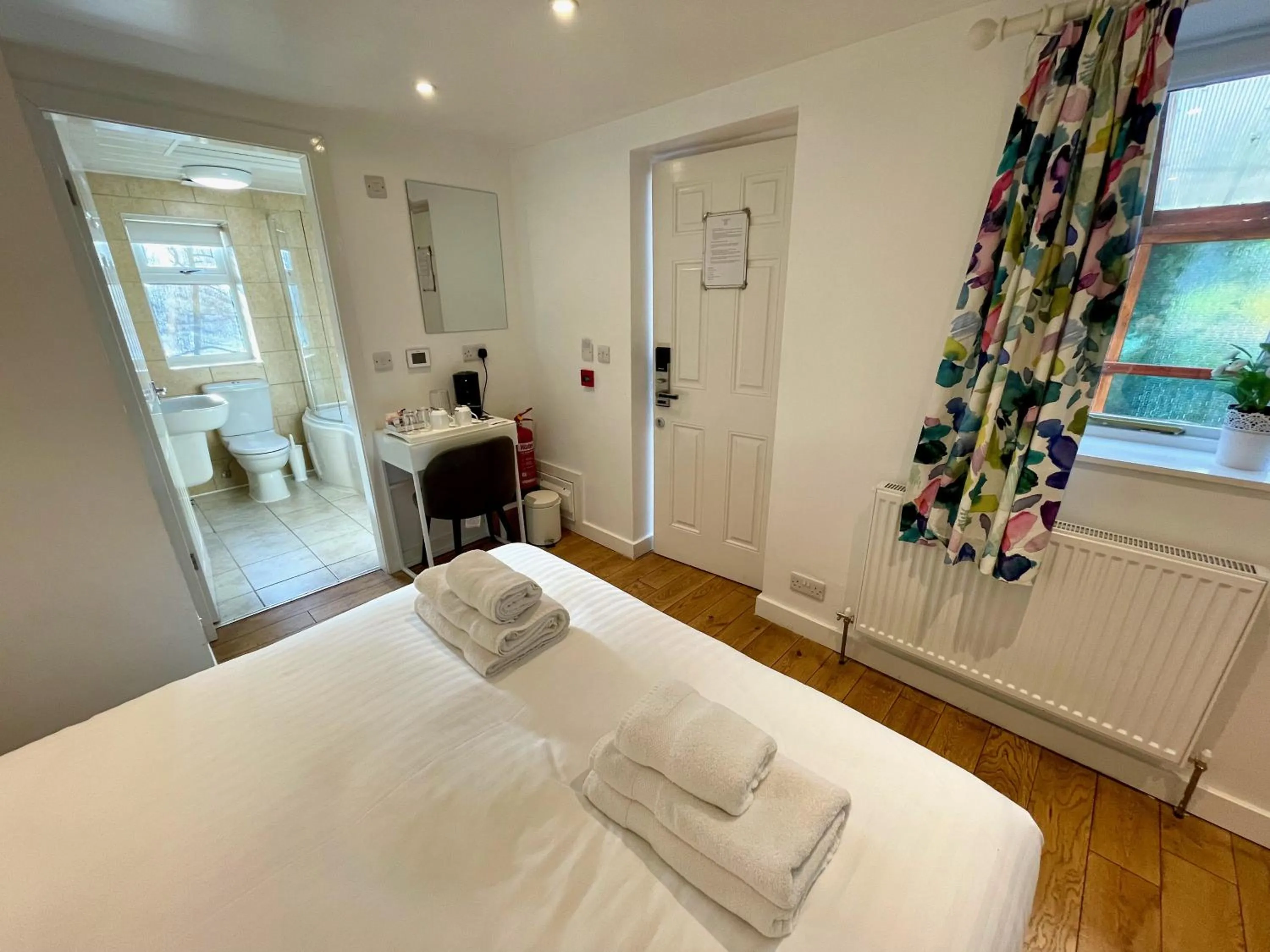 Bed in The Queen's Head Hotel