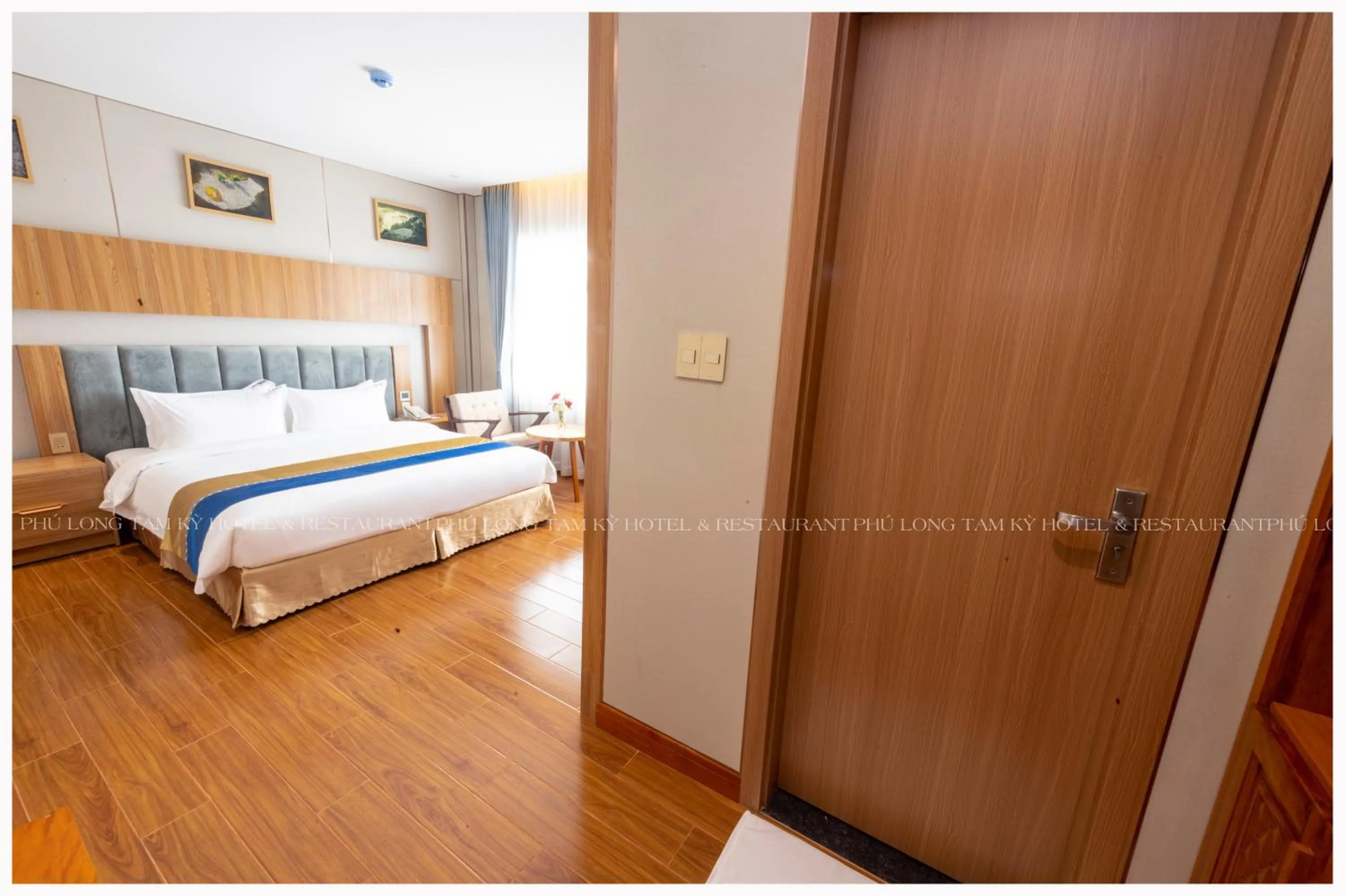 Bed in Phú Long Tam Kỳ Hotel & Restaurant