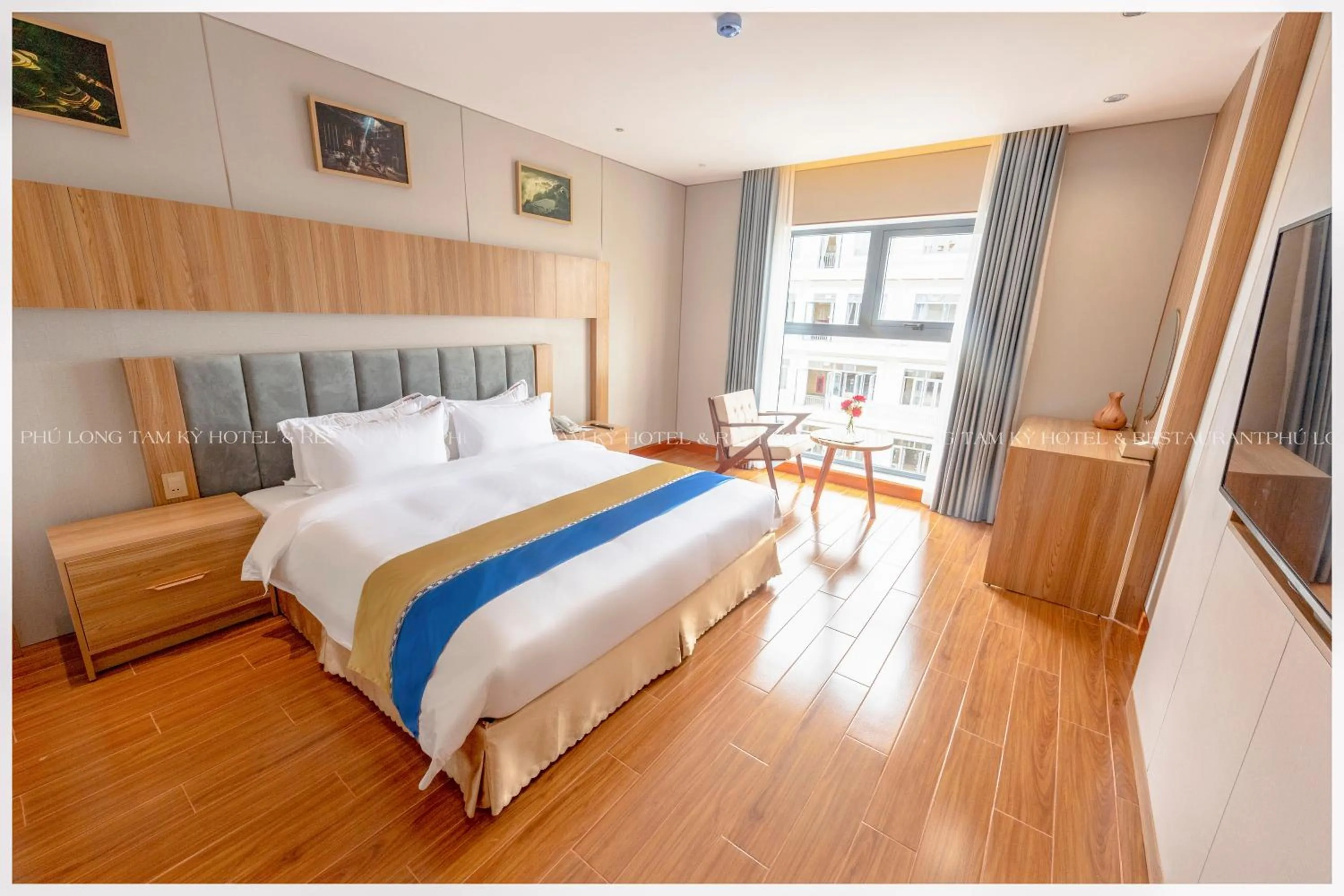 Bedroom in Phú Long Tam Kỳ Hotel & Restaurant