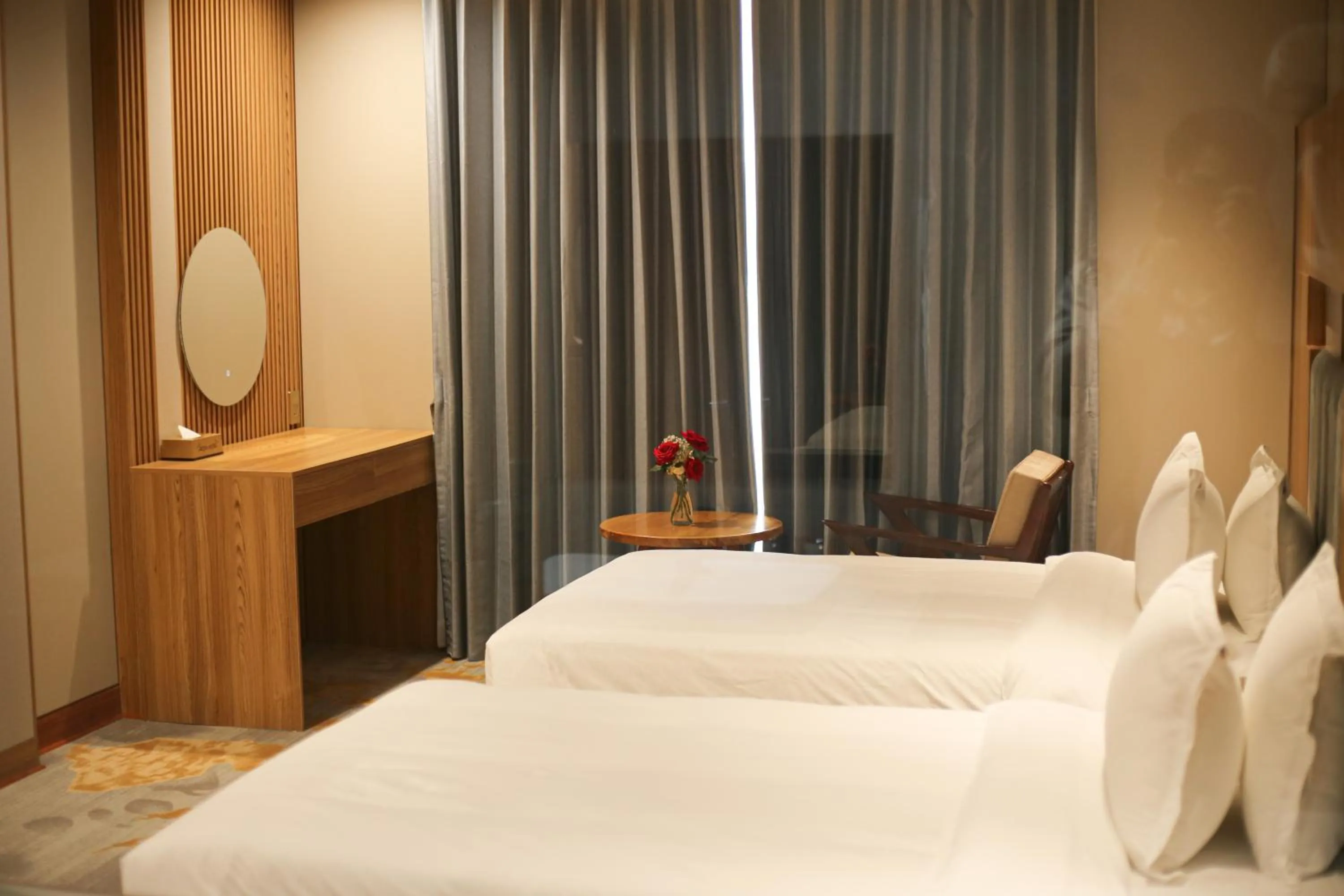 Bed in Phú Long Tam Kỳ Hotel & Restaurant