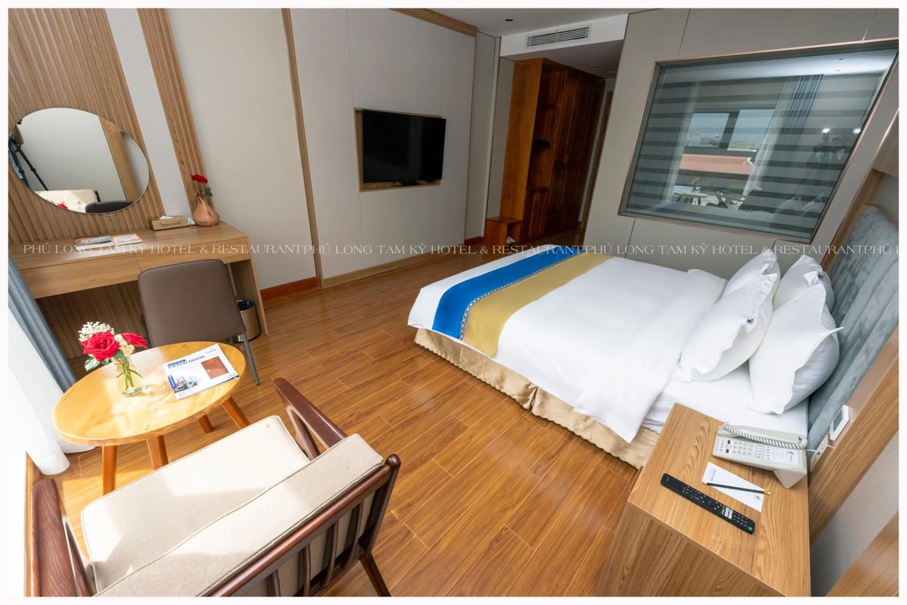 Photo of the whole room in Phú Long Tam Kỳ Hotel & Restaurant