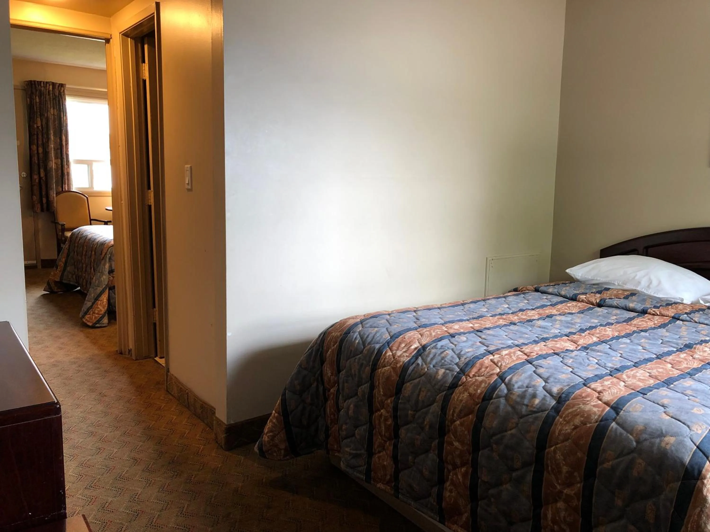 Bed in Travellers Inn