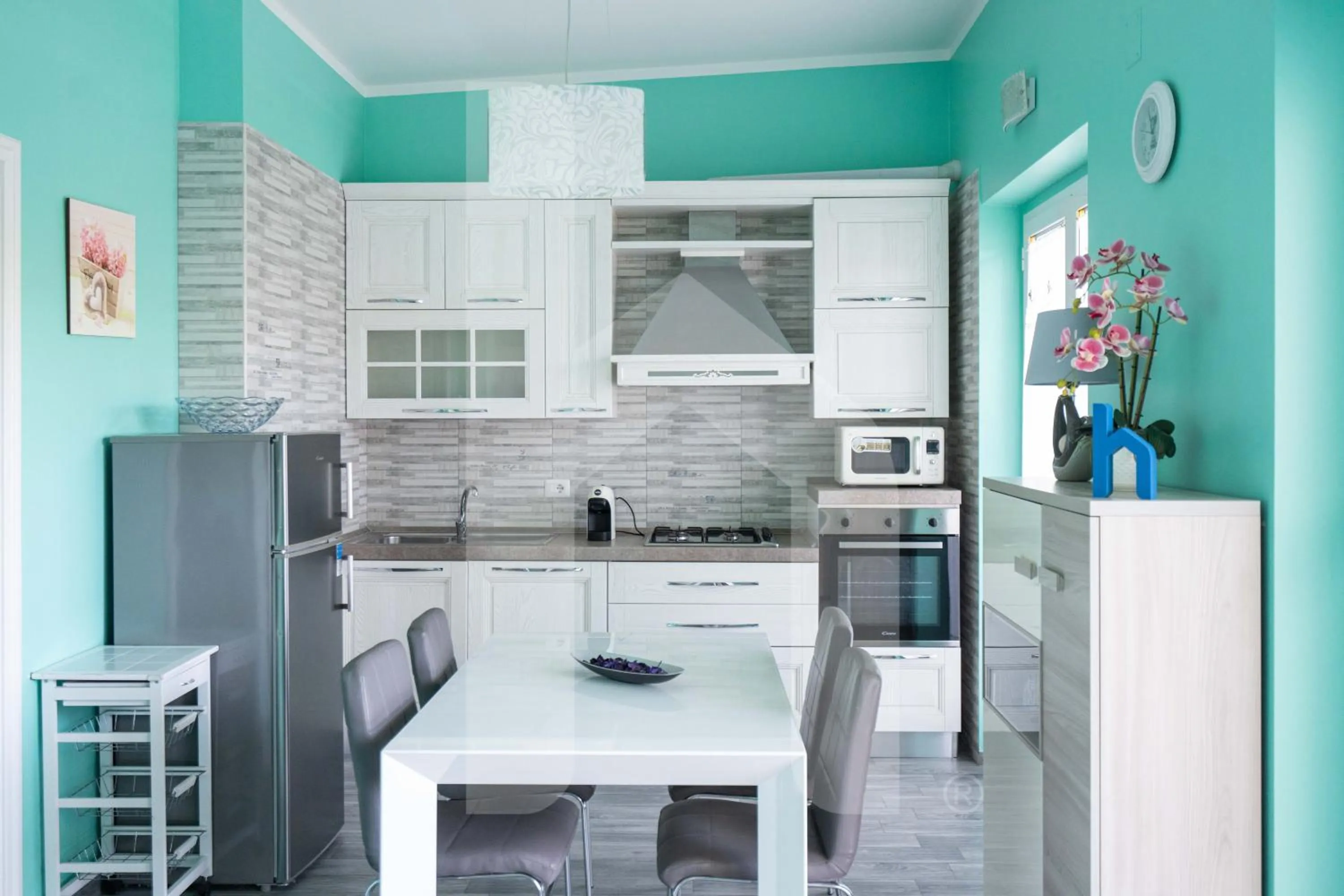 Kitchen or kitchenette in Homiday - Residence Mykonos