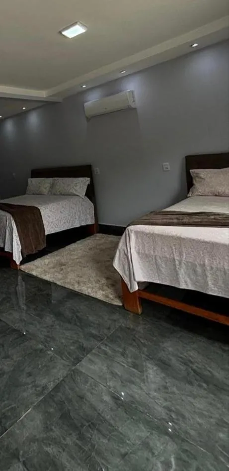Bed in Pousada Cascata de Pedra