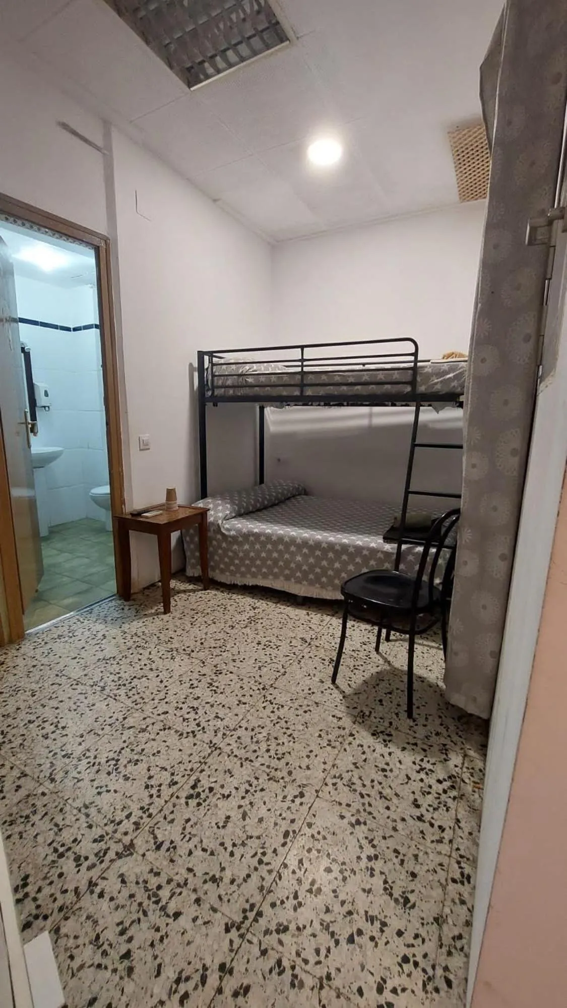 Bed in Pension Suiza