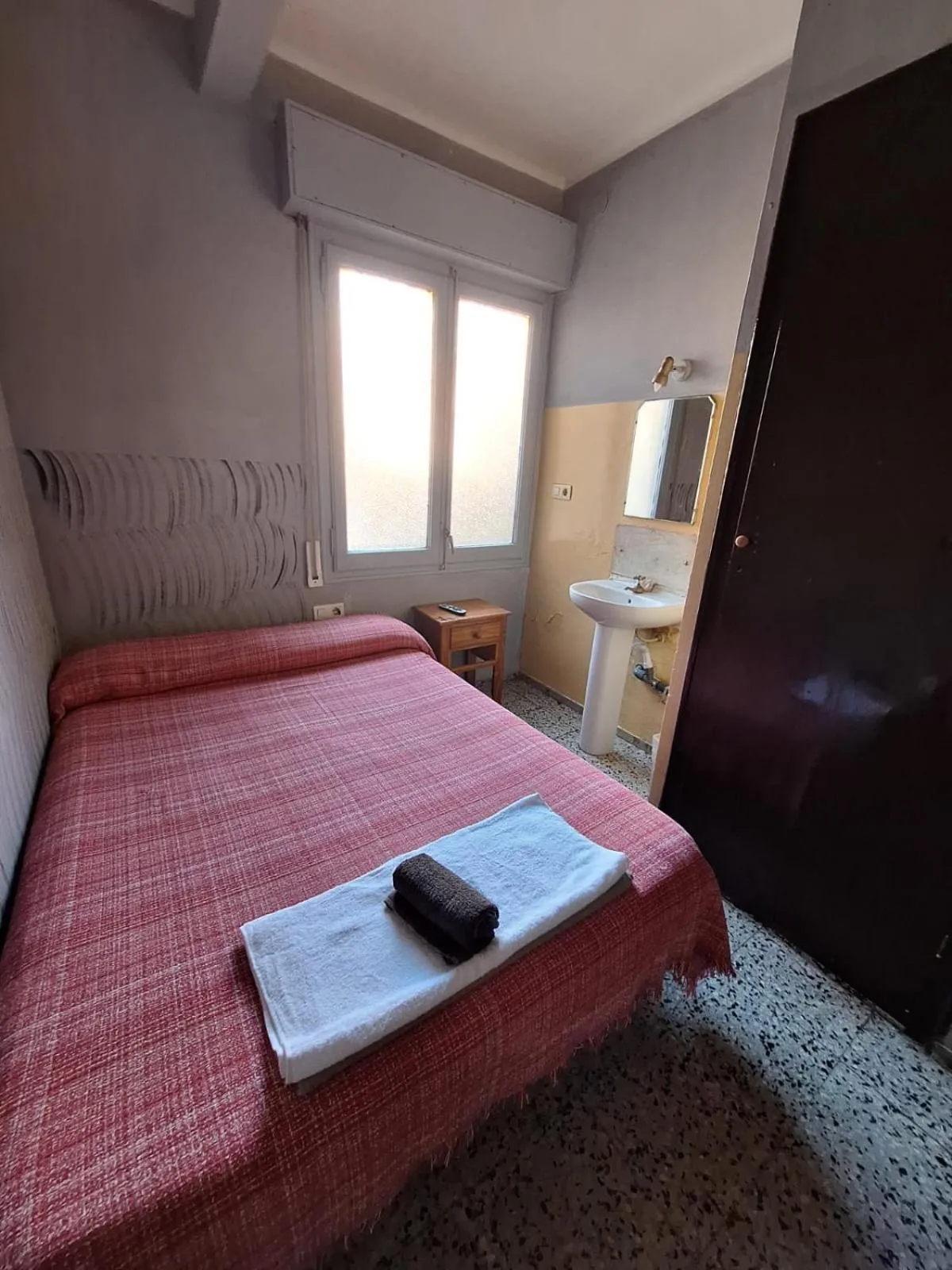 Bed in Pension Suiza