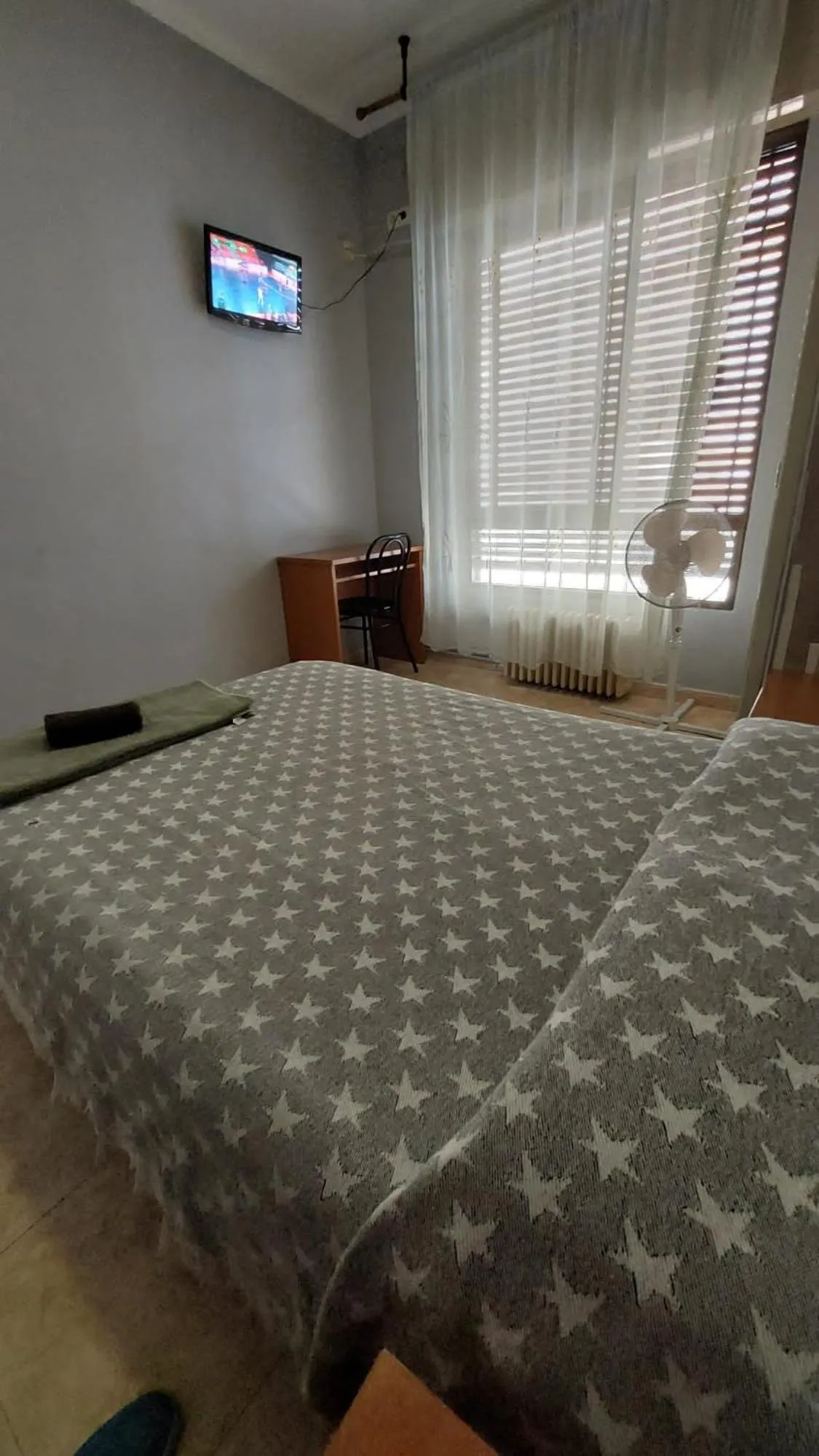 Bed in Pension Suiza