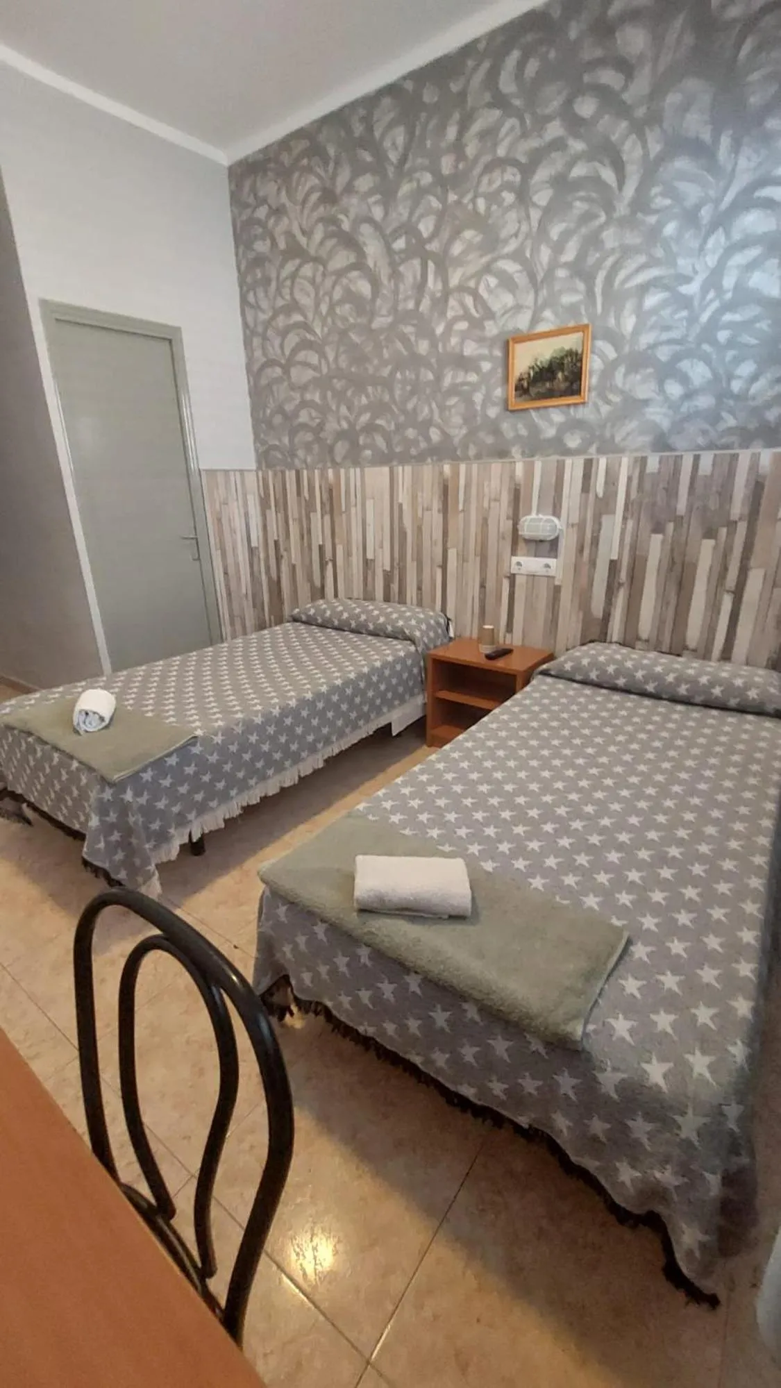 Bed in Pension Suiza
