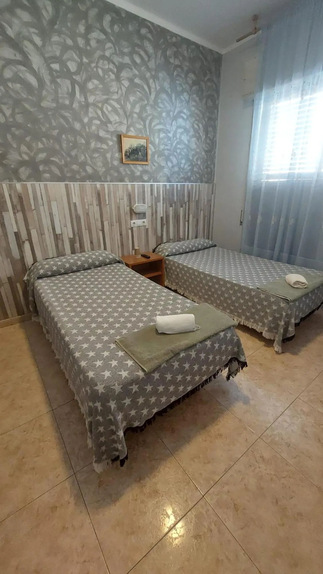 Bed in Pension Suiza