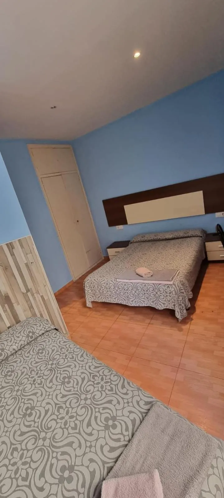 Bed in Pension Suiza