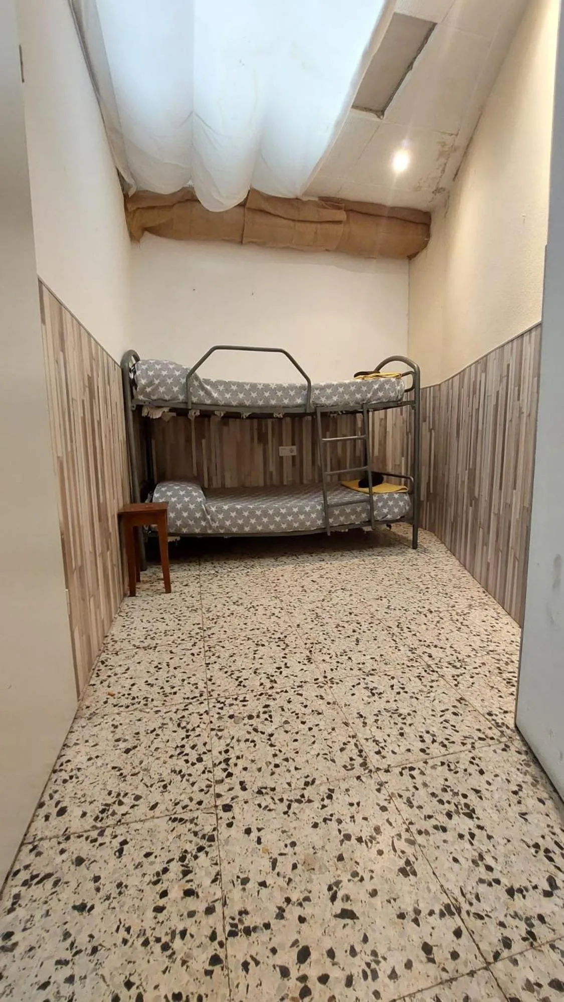Bed in Pension Suiza