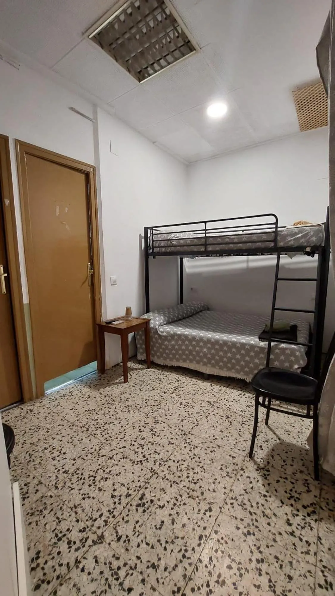 Bed in Pension Suiza
