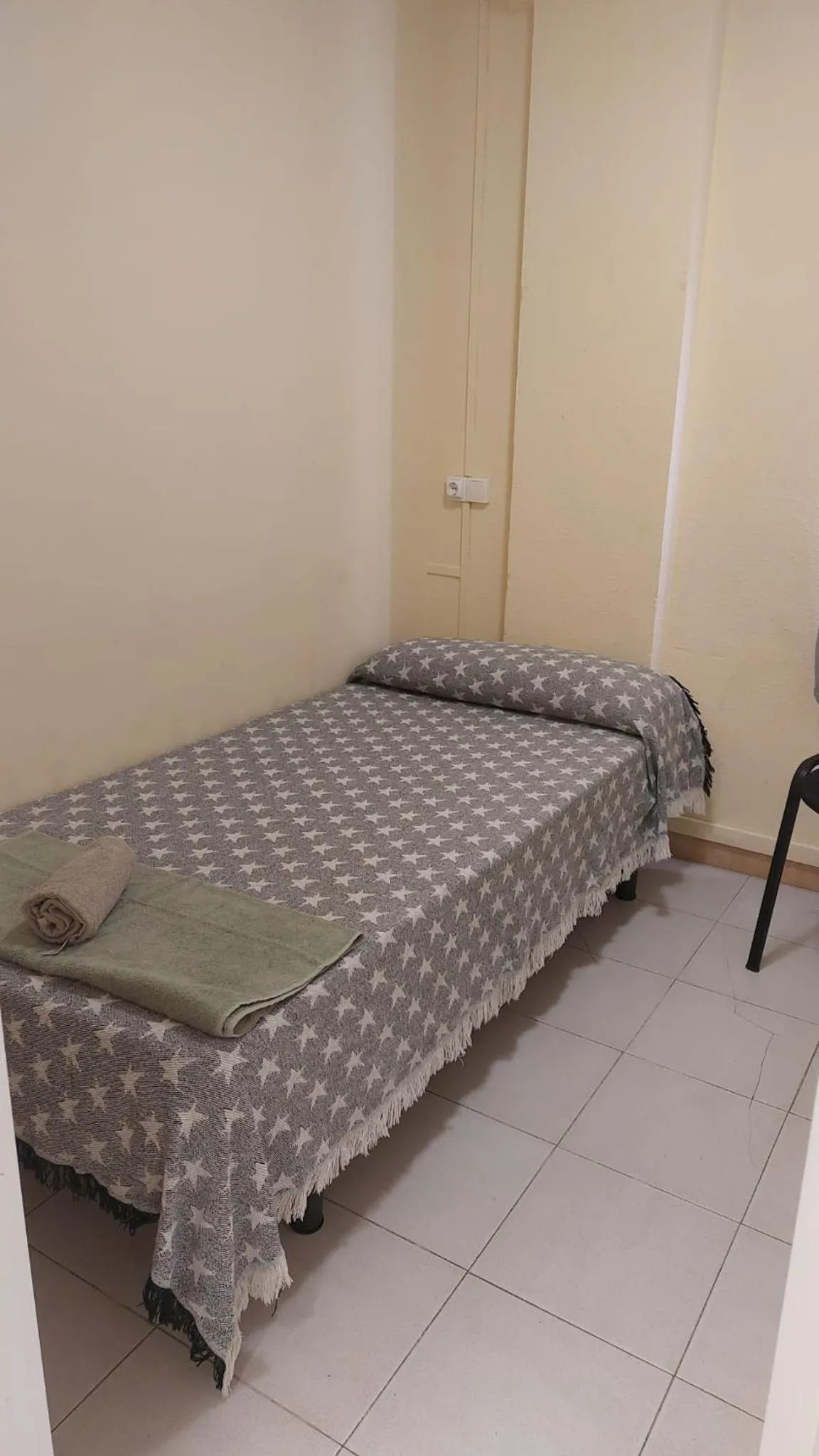 Bed in Pension Suiza