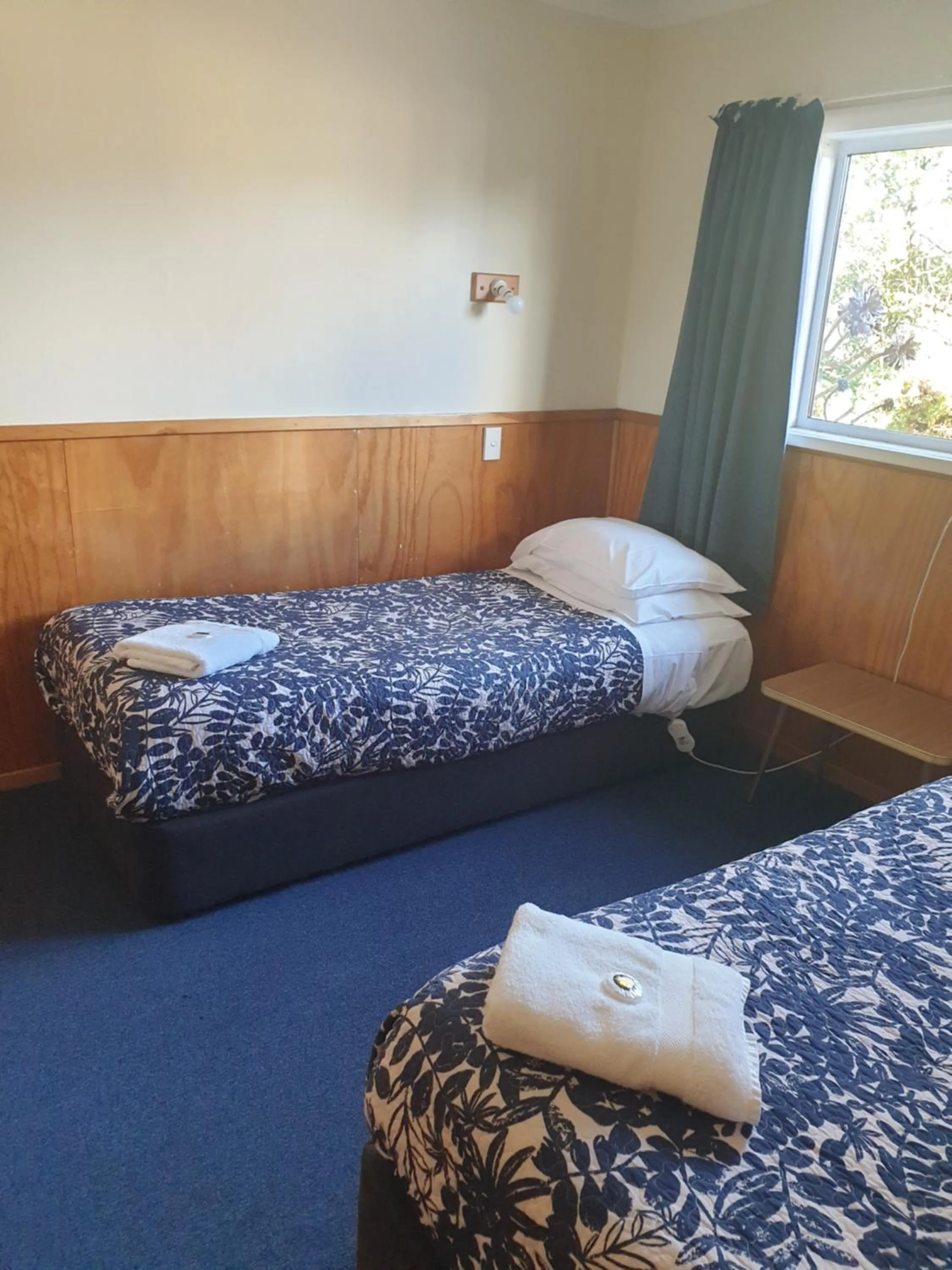 Bed in Otaki Motel