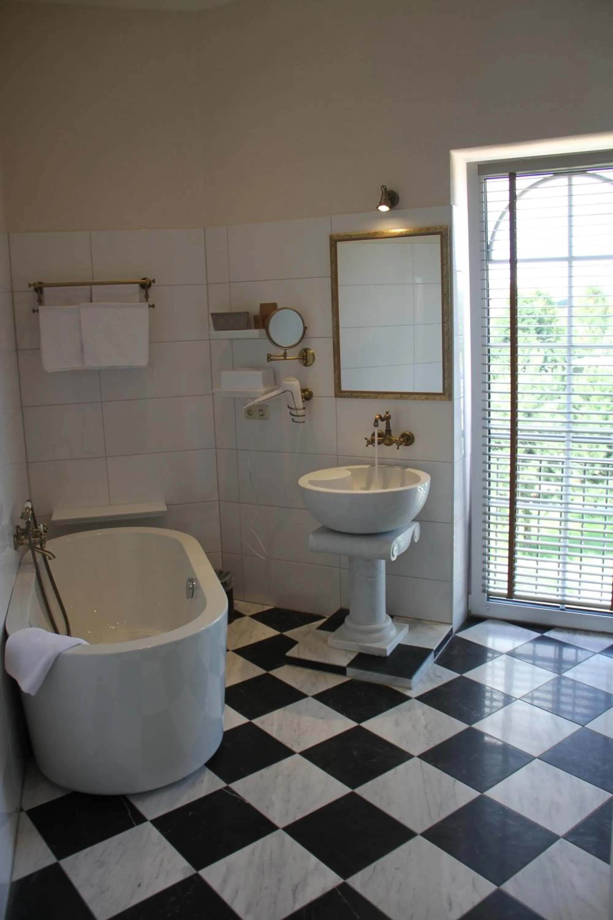 Bathroom in Kur-& Landhotel Borstel - Treff