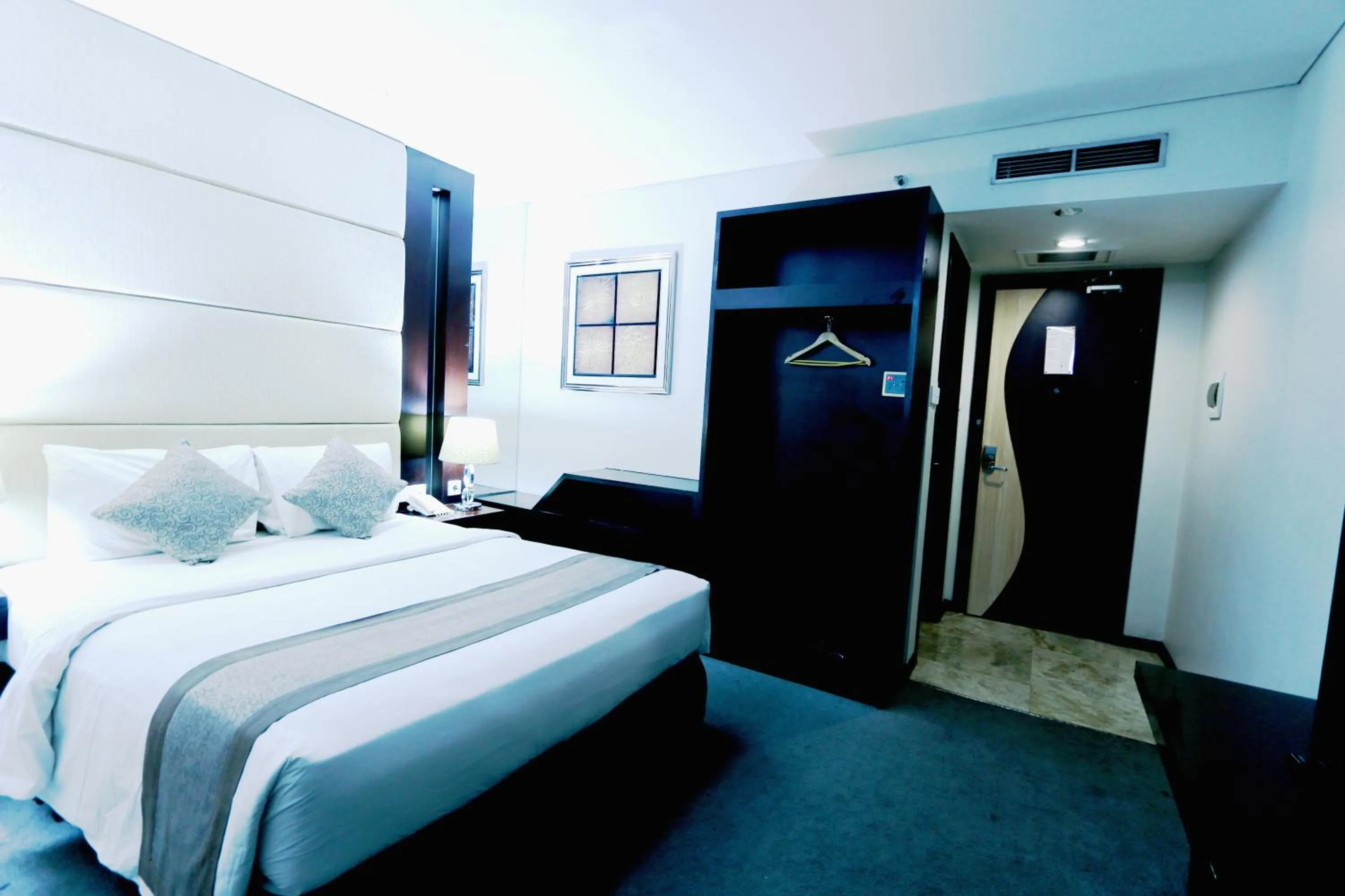 Bed in Serela Waringin by KAGUM Hotels