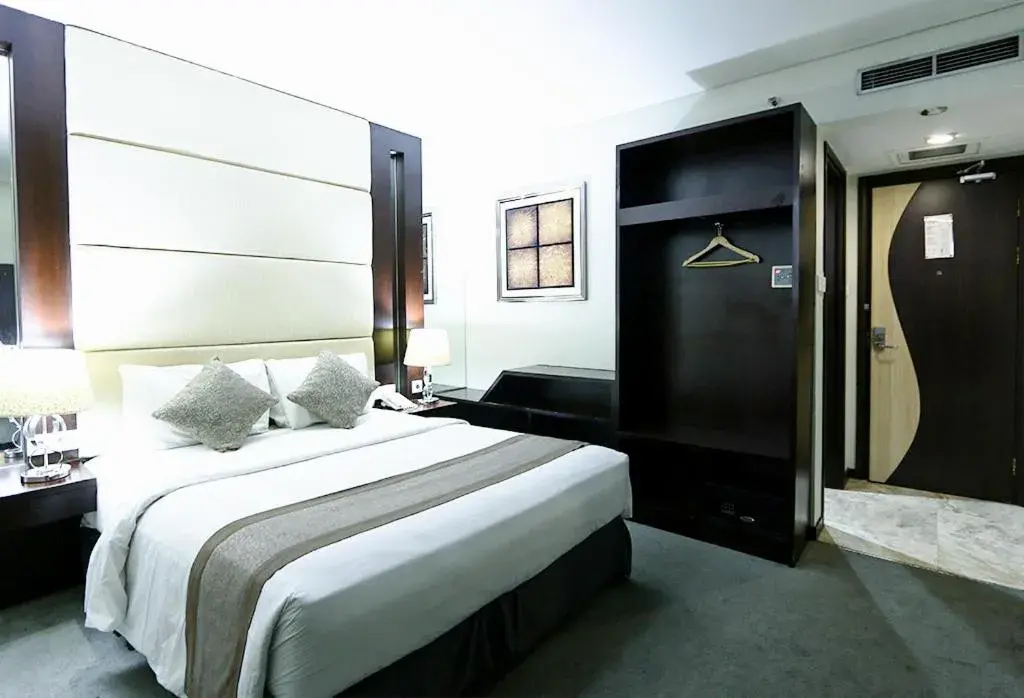 Bed in Serela Waringin by KAGUM Hotels Bed in Serela Waringin by KAGUM Hotels
