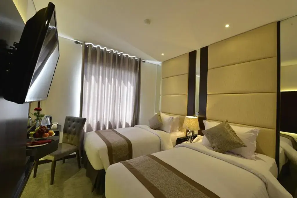 Bed in Serela Waringin by KAGUM Hotels Bed in Serela Waringin by KAGUM Hotels