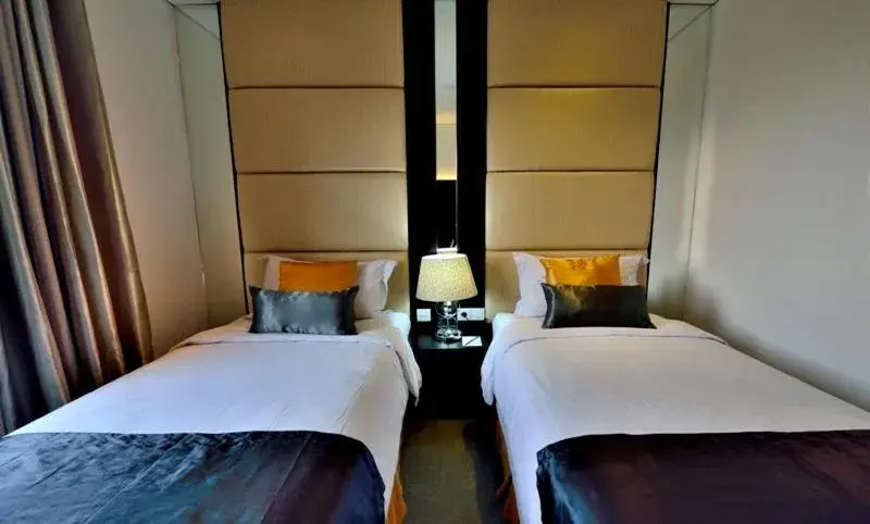 Bed in Serela Waringin by KAGUM Hotels Bed in Serela Waringin by KAGUM Hotels