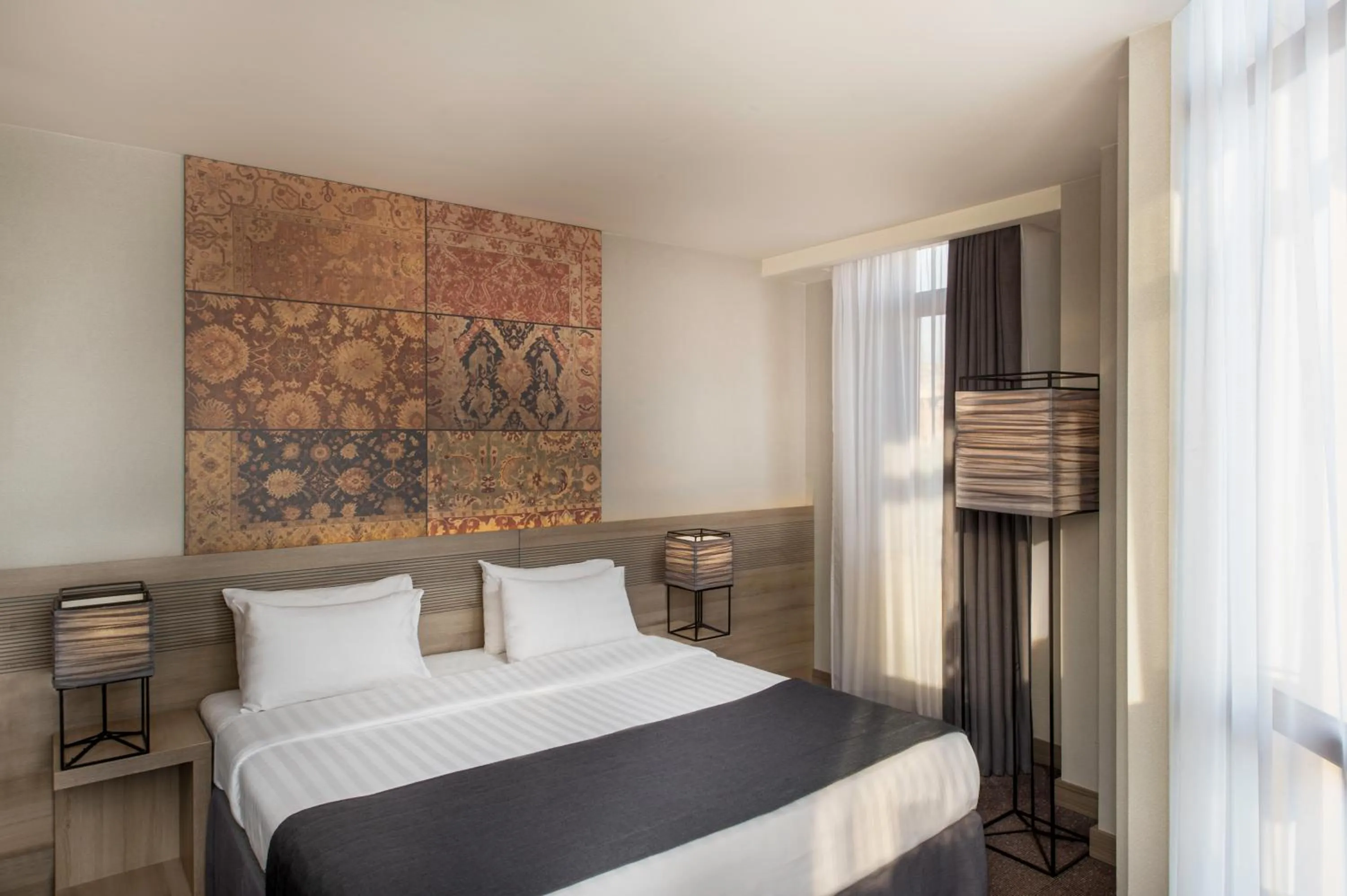 Bed in Republica Hotel Yerevan