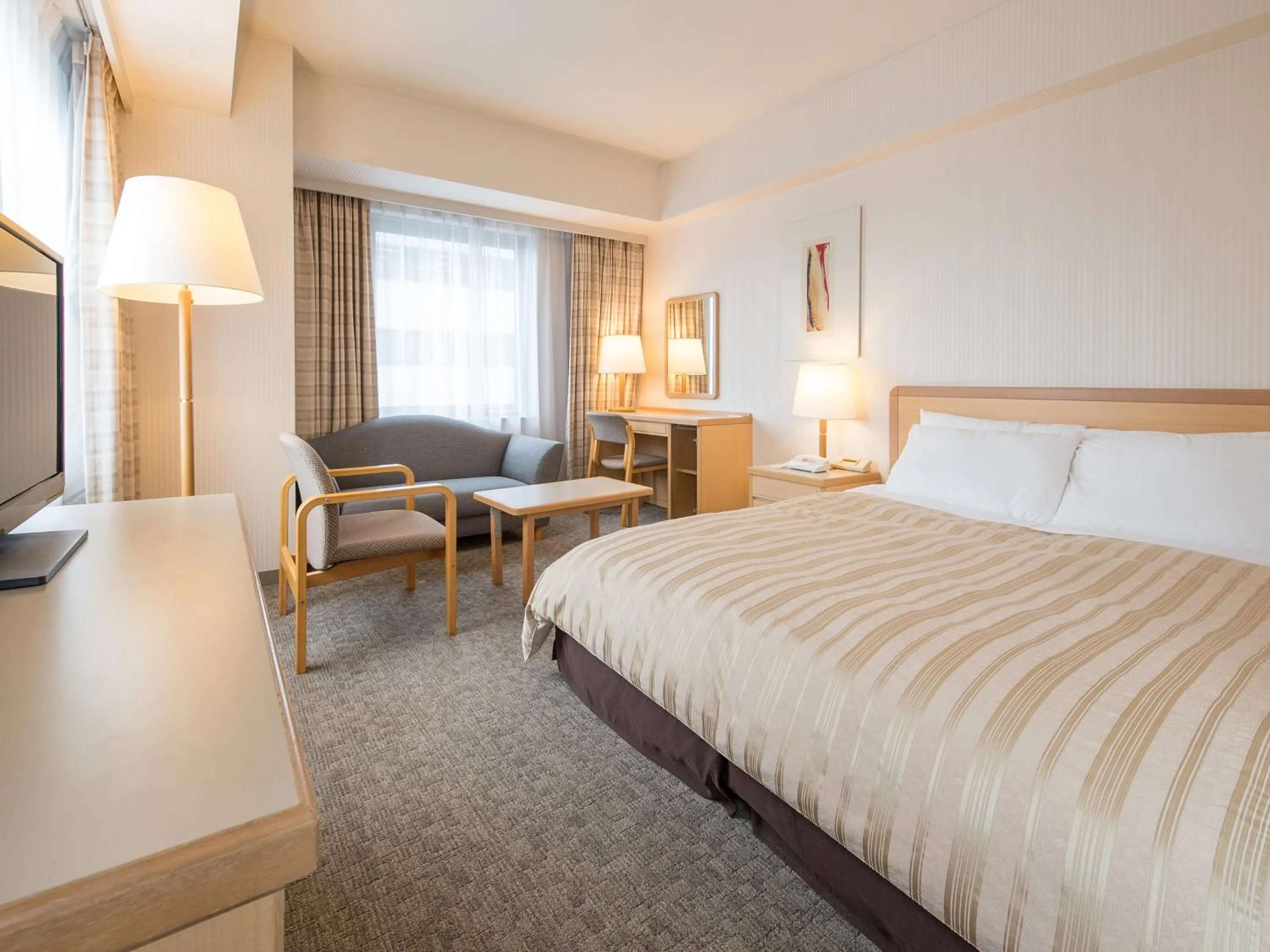 Seating area, Bed in President Hotel Mito