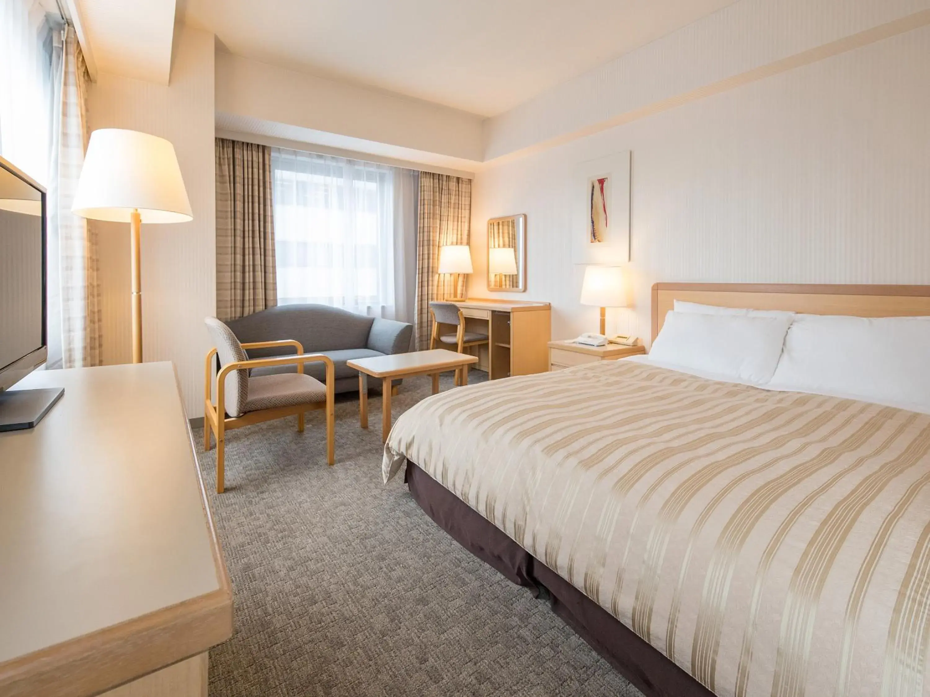 Seating area, Bed in President Hotel Mito Seating area, Bed in President Hotel Mito