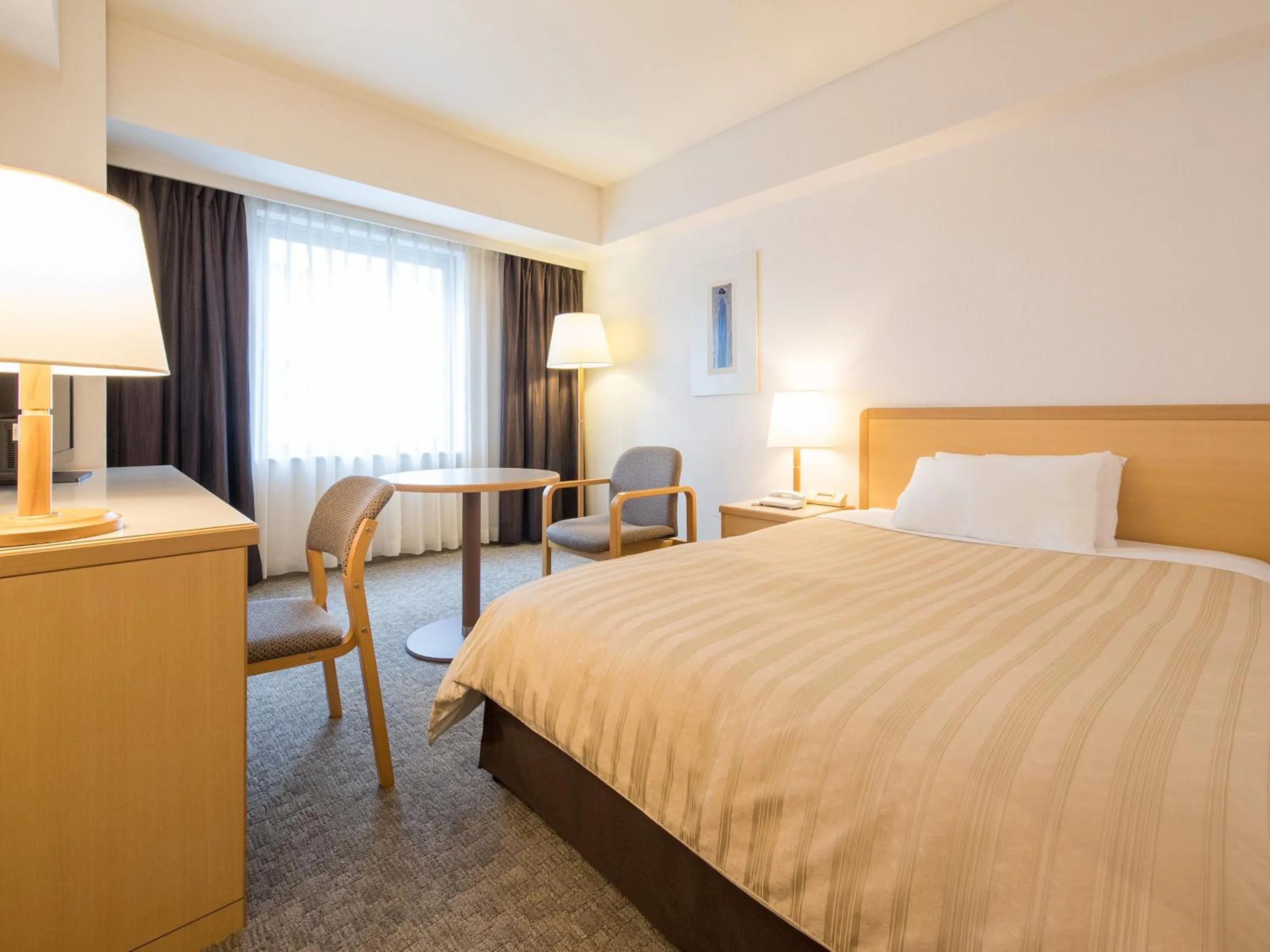 Bed in President Hotel Mito