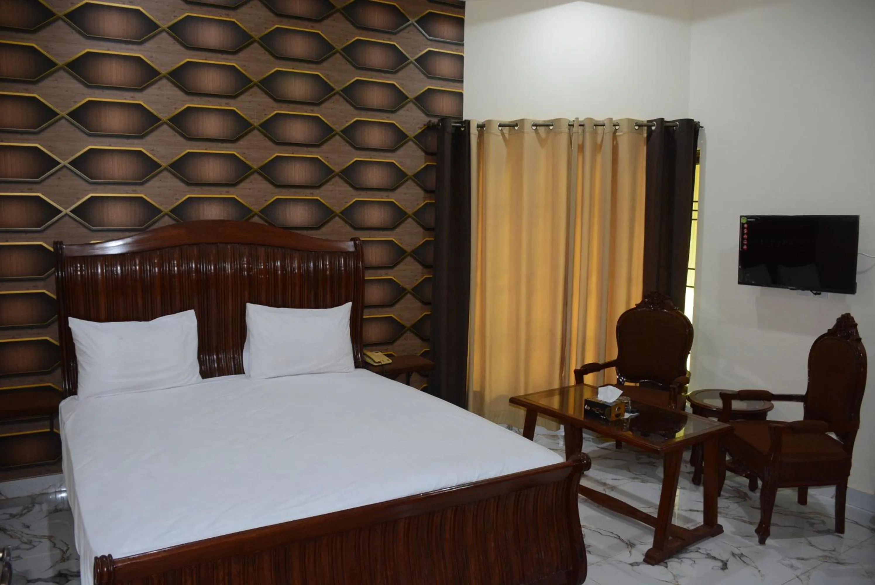 Photo of the whole room in Hotel The Taj Multan